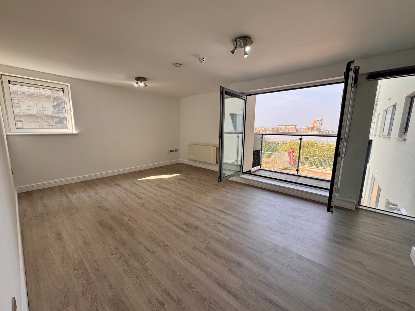 Riverside Living Two Bedroom Apartment with Balcony & Secured Underground Parking