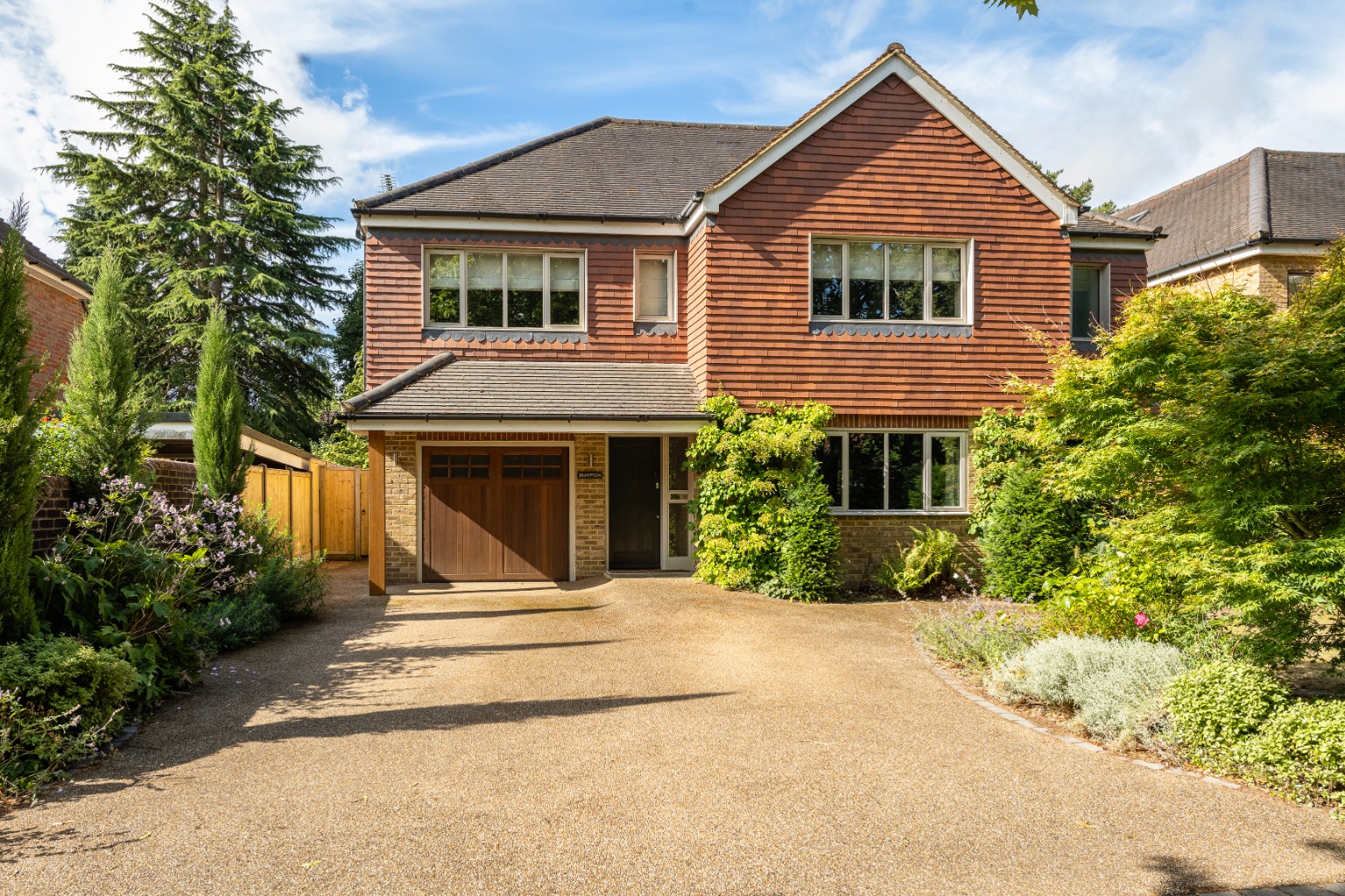 A refined modern family home, thoughtfully upgraded in a premier Shootersway lane cul-de-sac