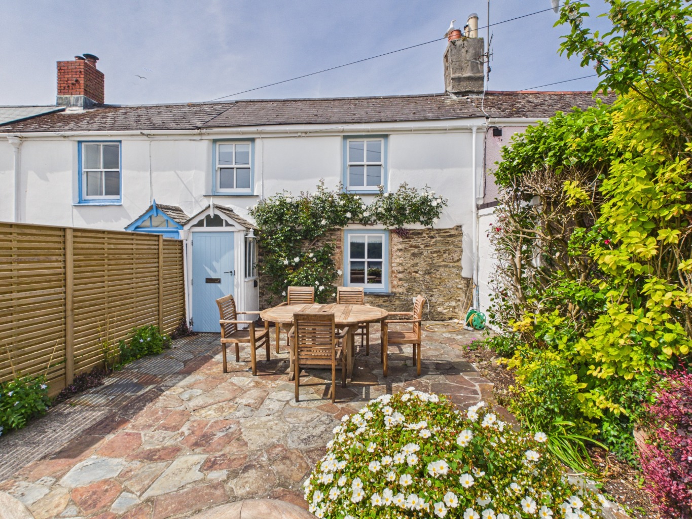 South-facing St Mawes cottage with harbour views, sun terrace and private garden.