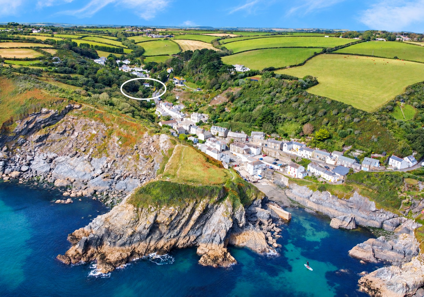 A Stylish and Private Coastal Village Home with Beautifully Landscaped Gardens