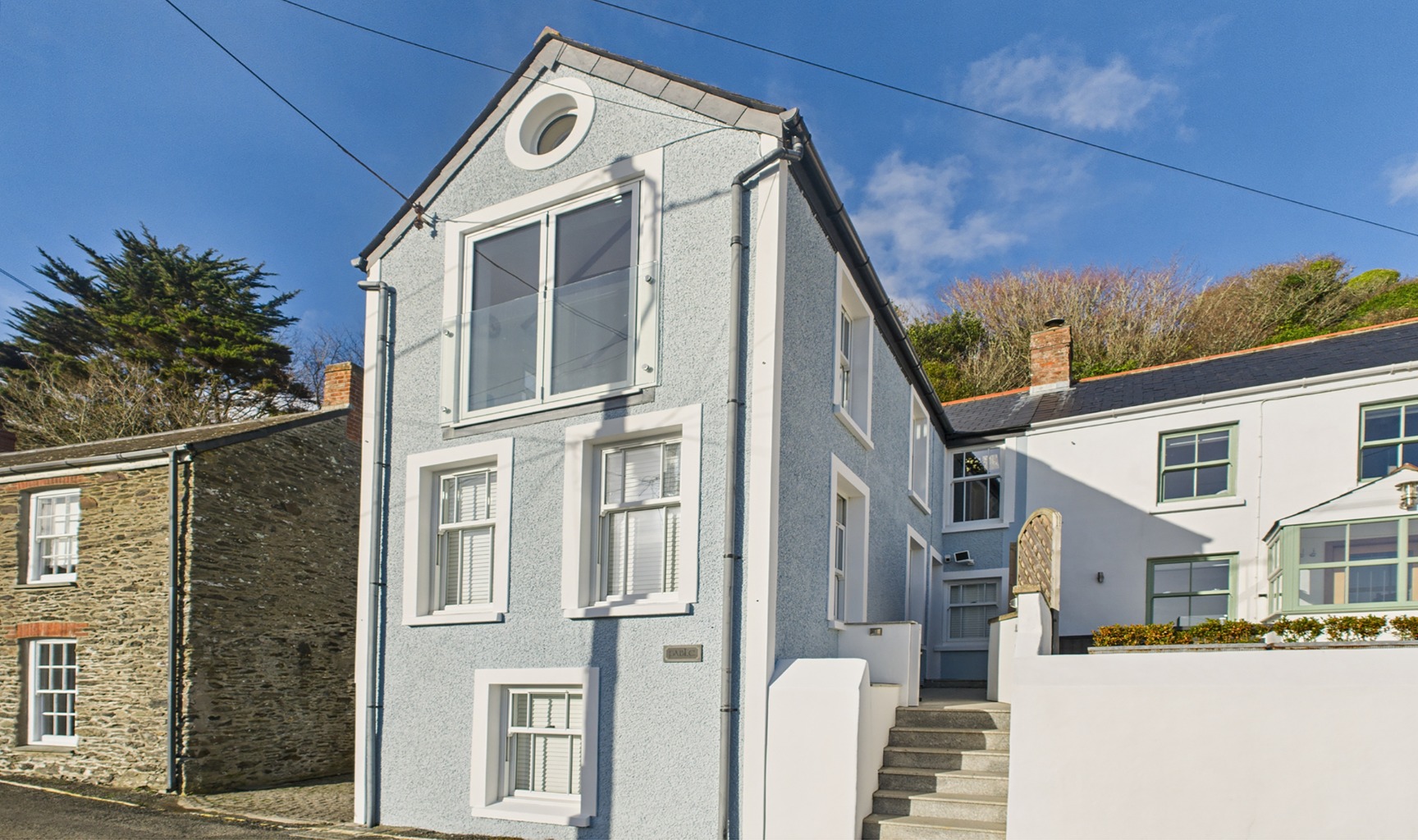 Elevated coastal living with panoramic sea views in the heart of Portloe