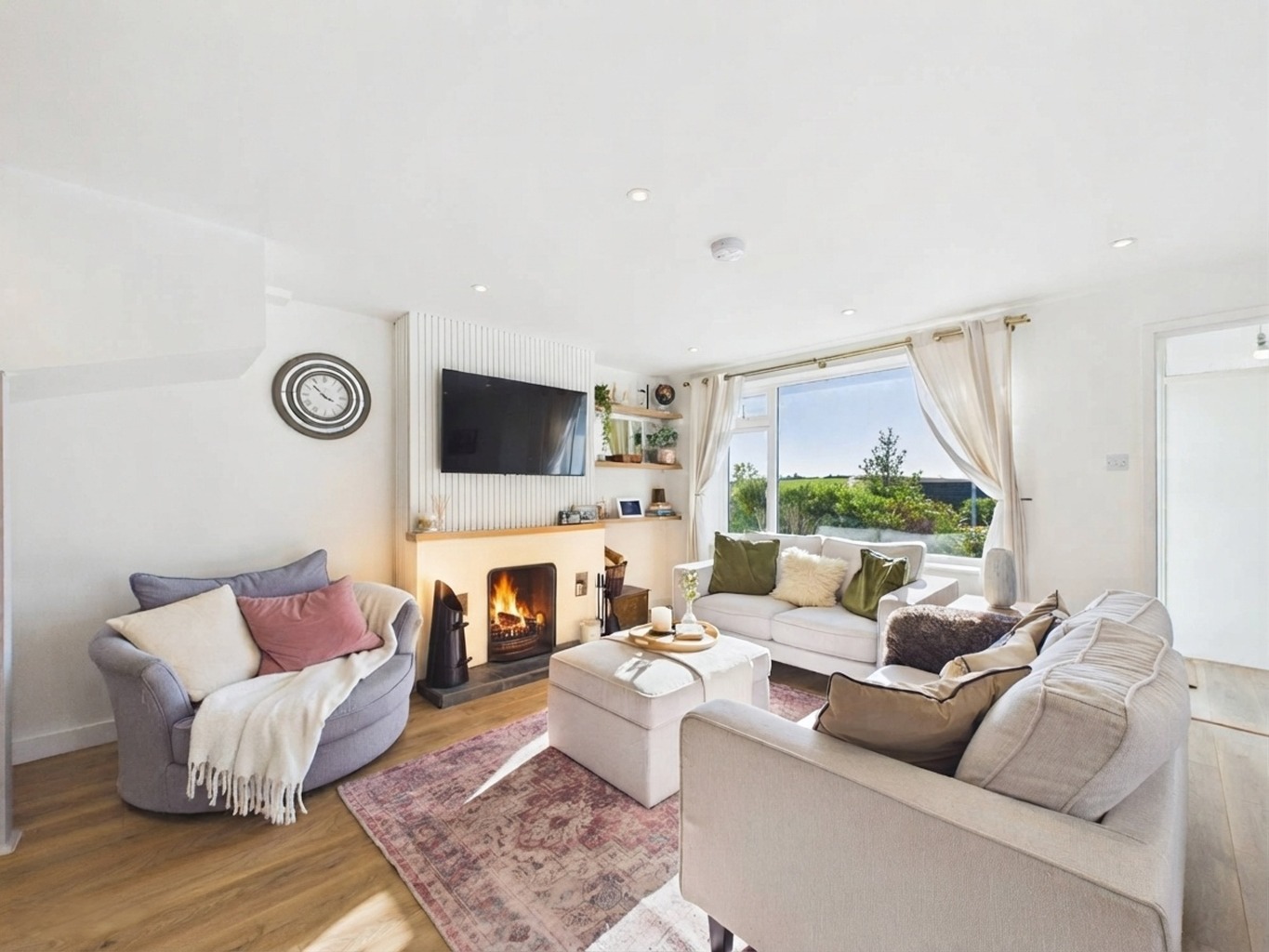 An impressive extended 3-bedroom home with countryside views, private gardens, garage & parking