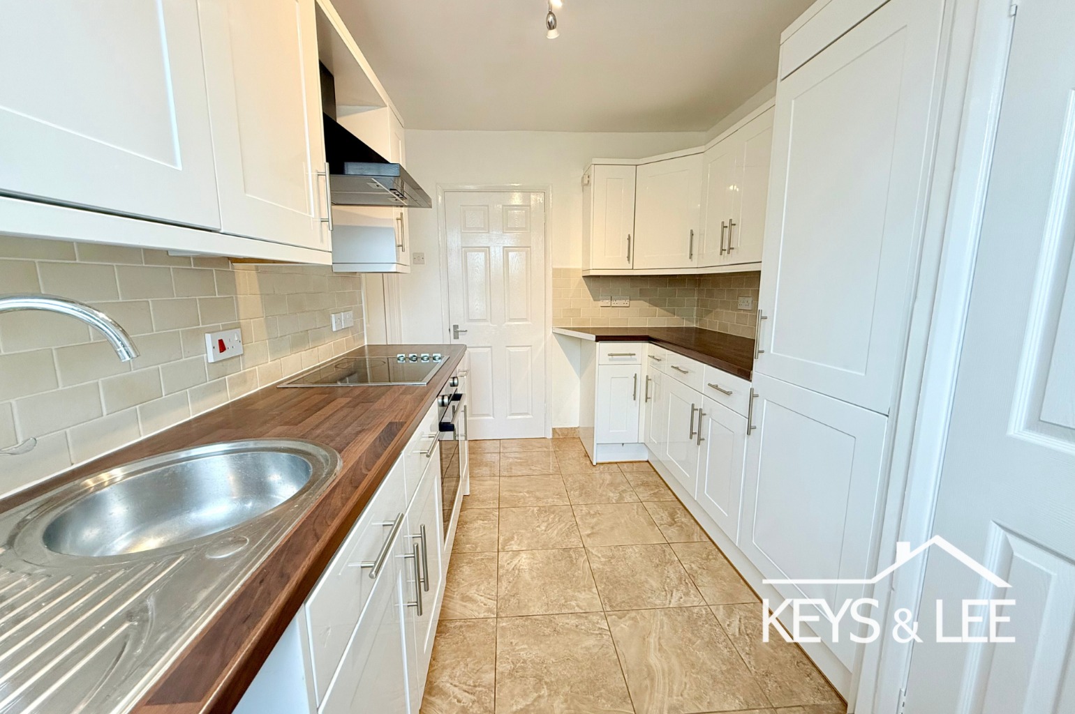 A modern 2 double bedroom first floor flat with front garden and allocated parking space. property first image