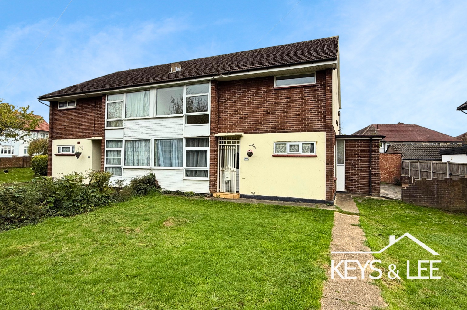 A modern 2 double bedroom first floor flat with front garden and allocated parking space. property first image