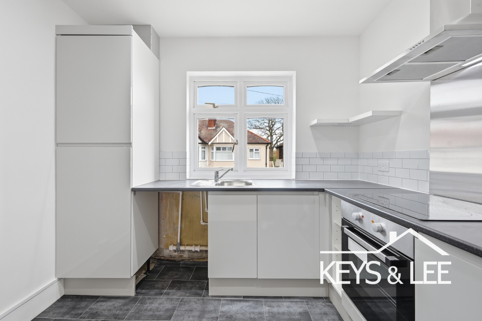 Fully refurbished 2 bedroom first floor flat with private garden and a smart modern finish. property first image