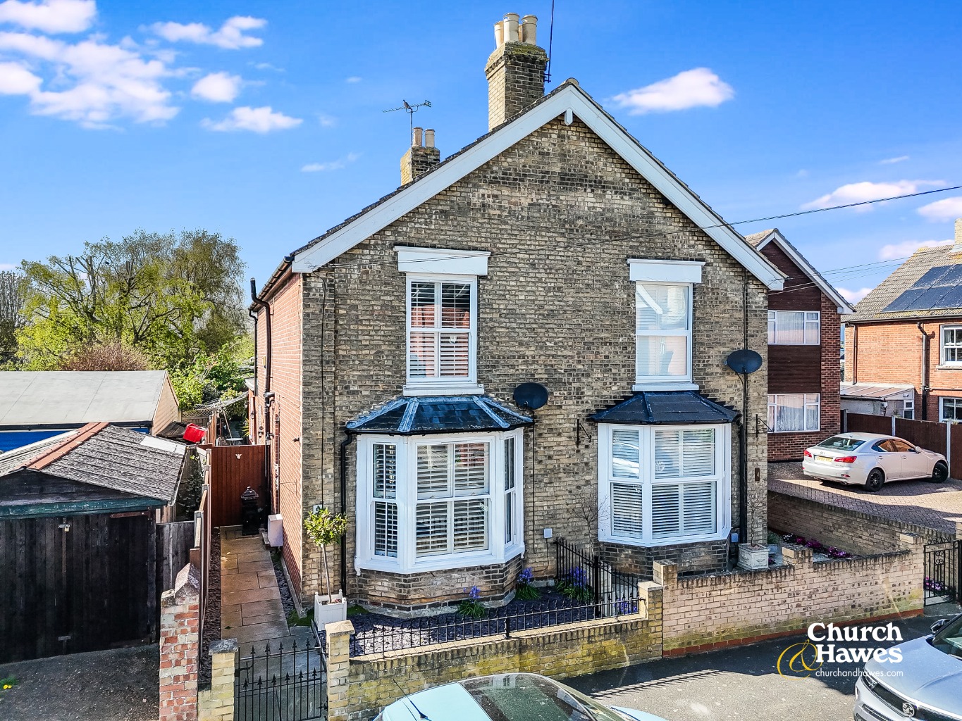 Beautifully extended two bedroom semi-detached, bay-fronted character home