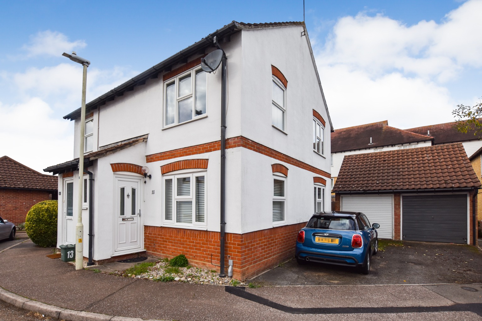 Ground floor two bedroom maisonette with own rear garden, modern shower room, fitted kitchen, garage