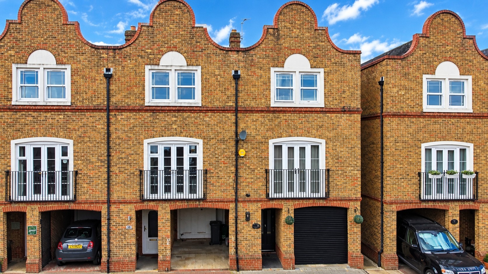 An exceptional three-storey home located within the sought after 'Dutch Style" development