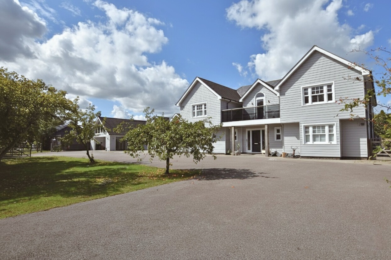A significant bespoke residence constructed to the owners high specification with detached annexe.