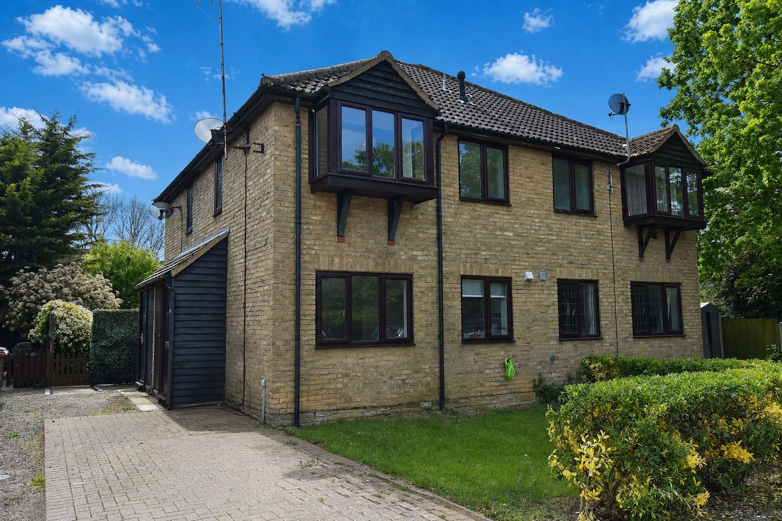 One bedroom freehold starter home with driveway parking and its own private garden