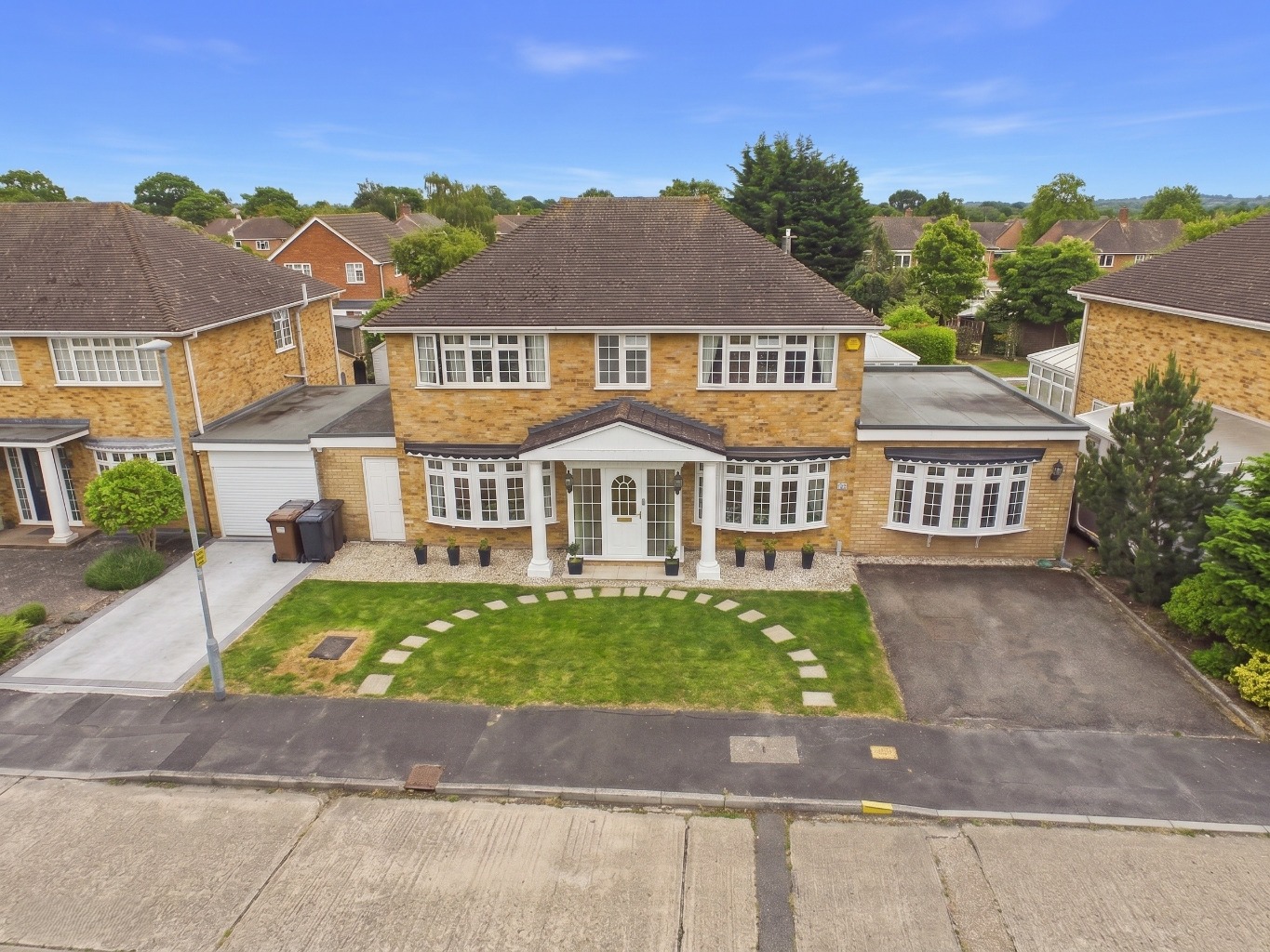 A simply stunning four bedroom, four reception executive family home.