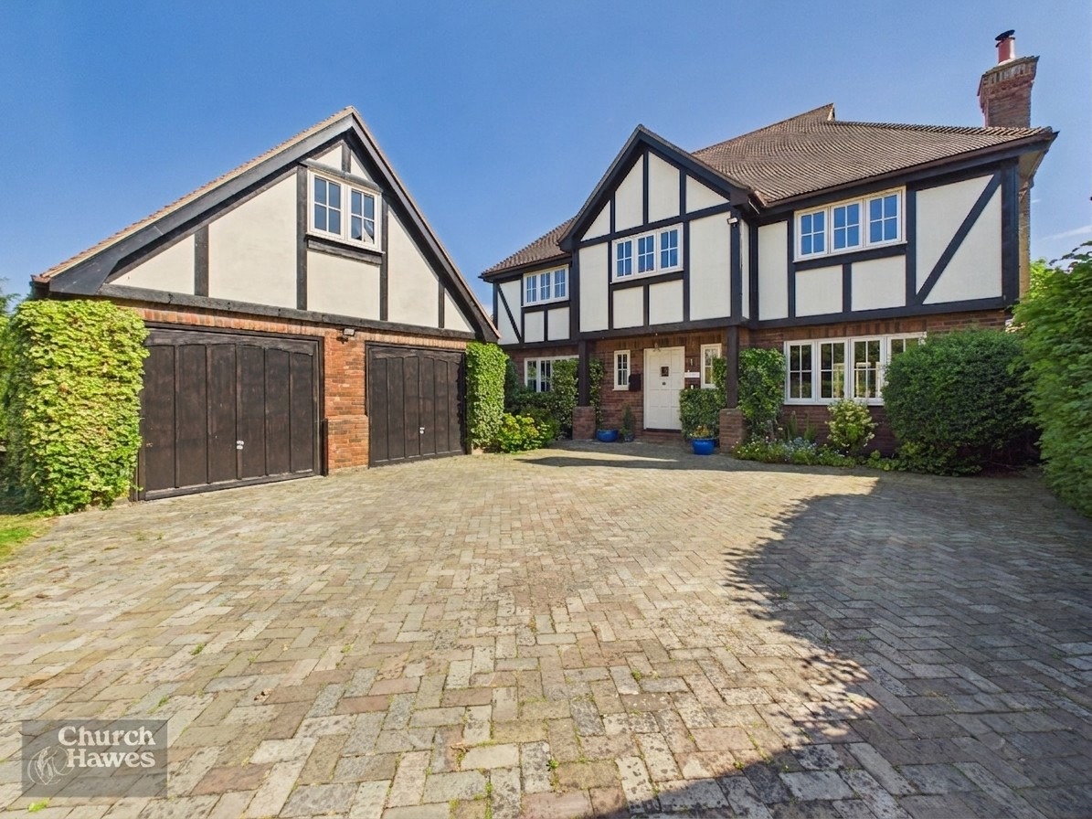 Extensively refurbished large four bedroom house on 1/4 acre plot