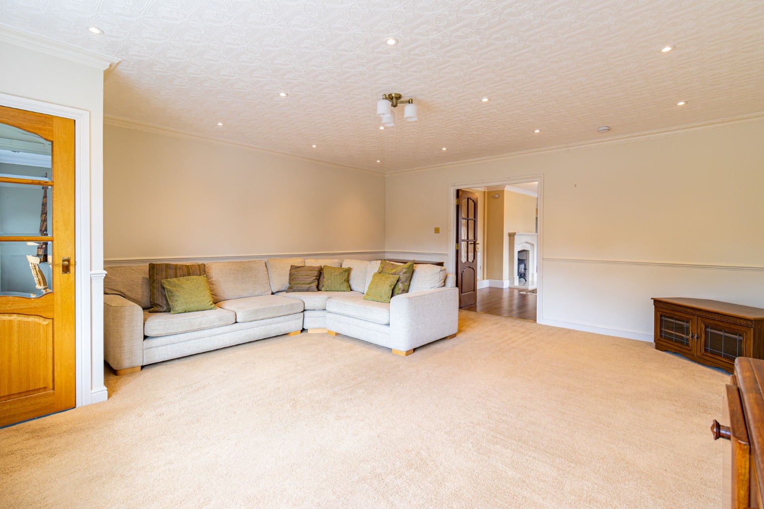 A SUBSTANTIAL FOUR BEDROOM DETACHED BUNGALOW IN A VILLAGE LOCATION