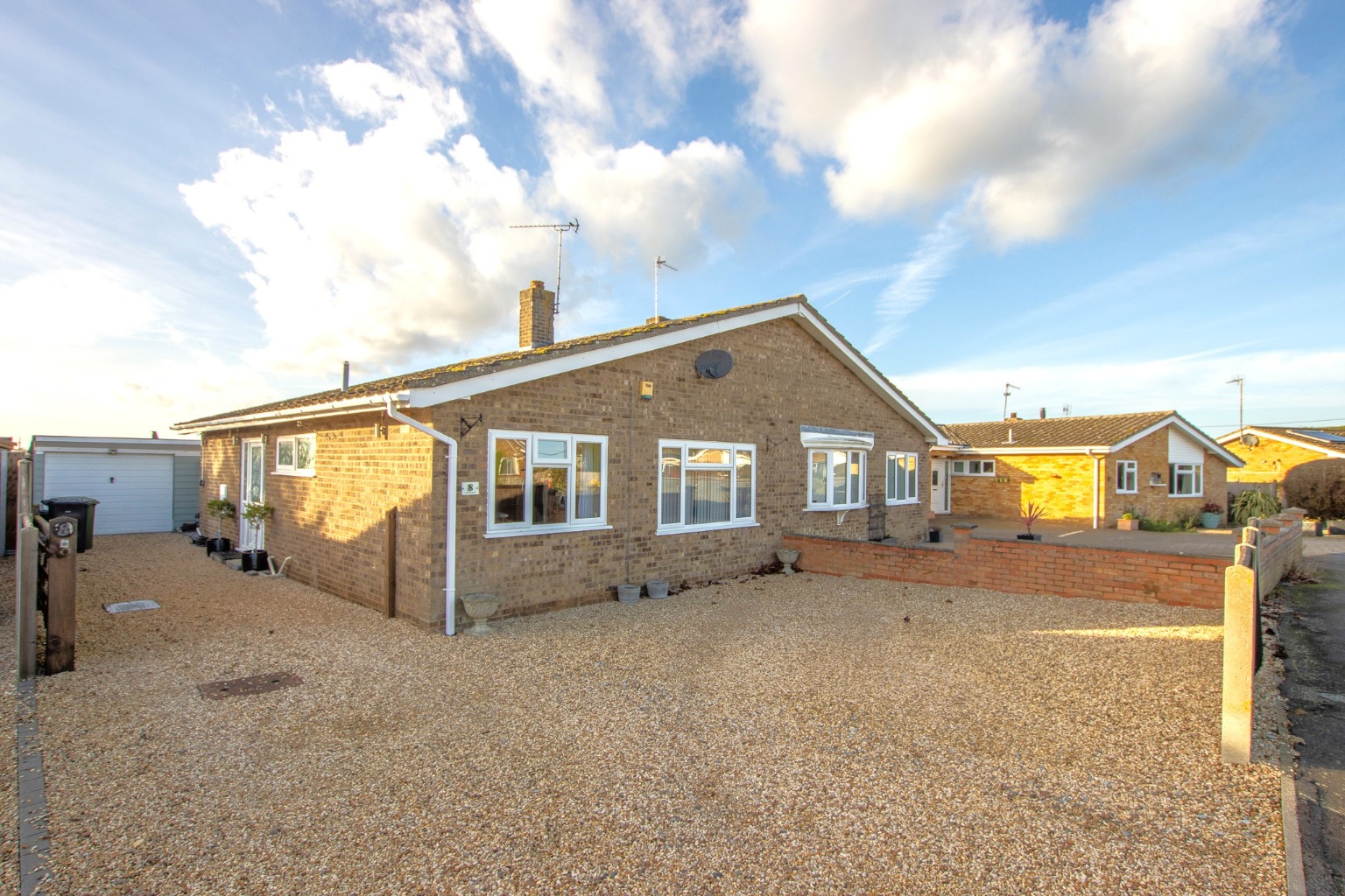 Spacious Two-Bedroom Bungalow with Garage, Private Driveway & Far-Reaching Field Views