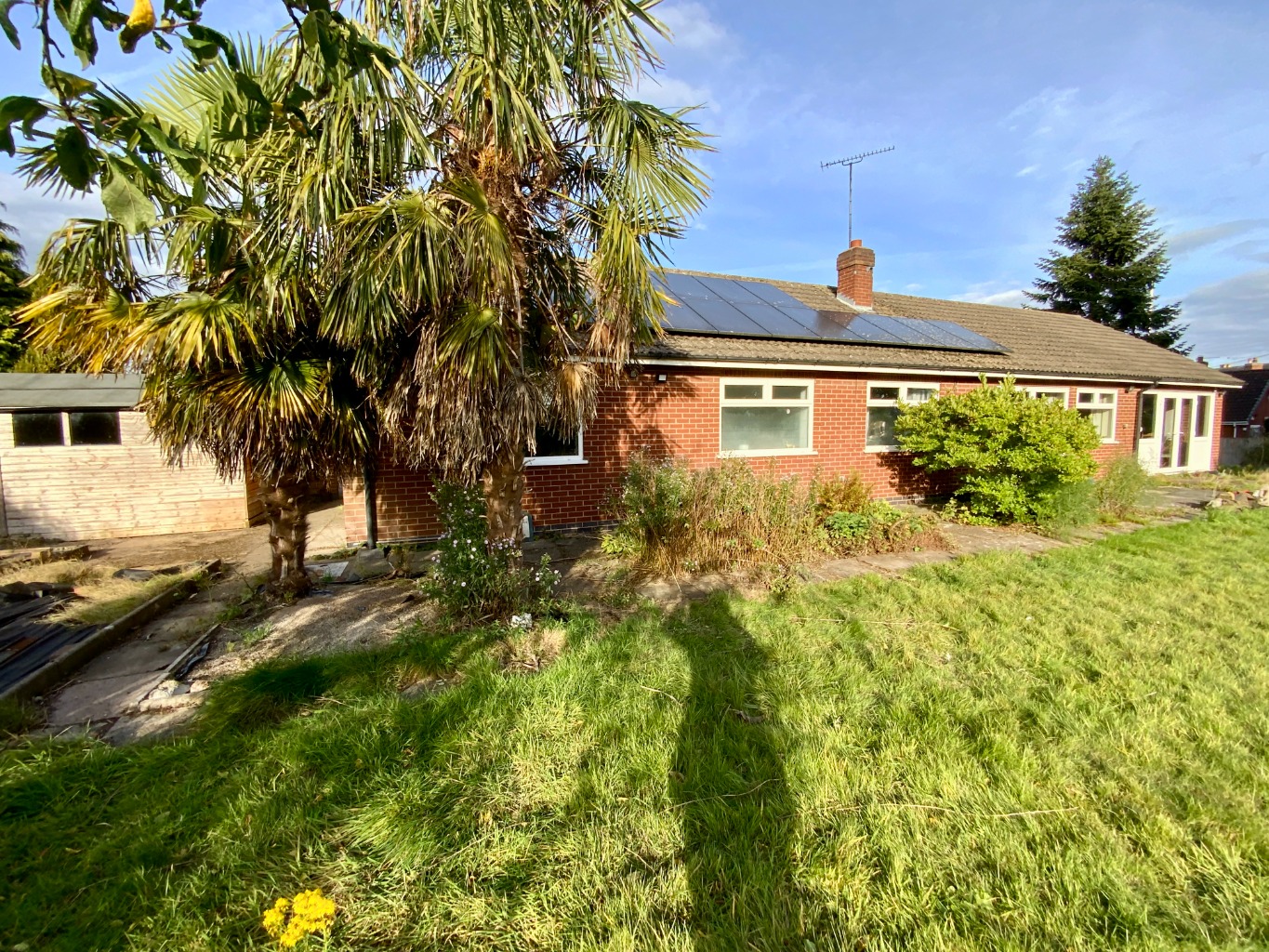 FOR SALE BY AUCTION *Additional fees apply - OVER HALF AN ACRE, Extended Bungalow with garage.