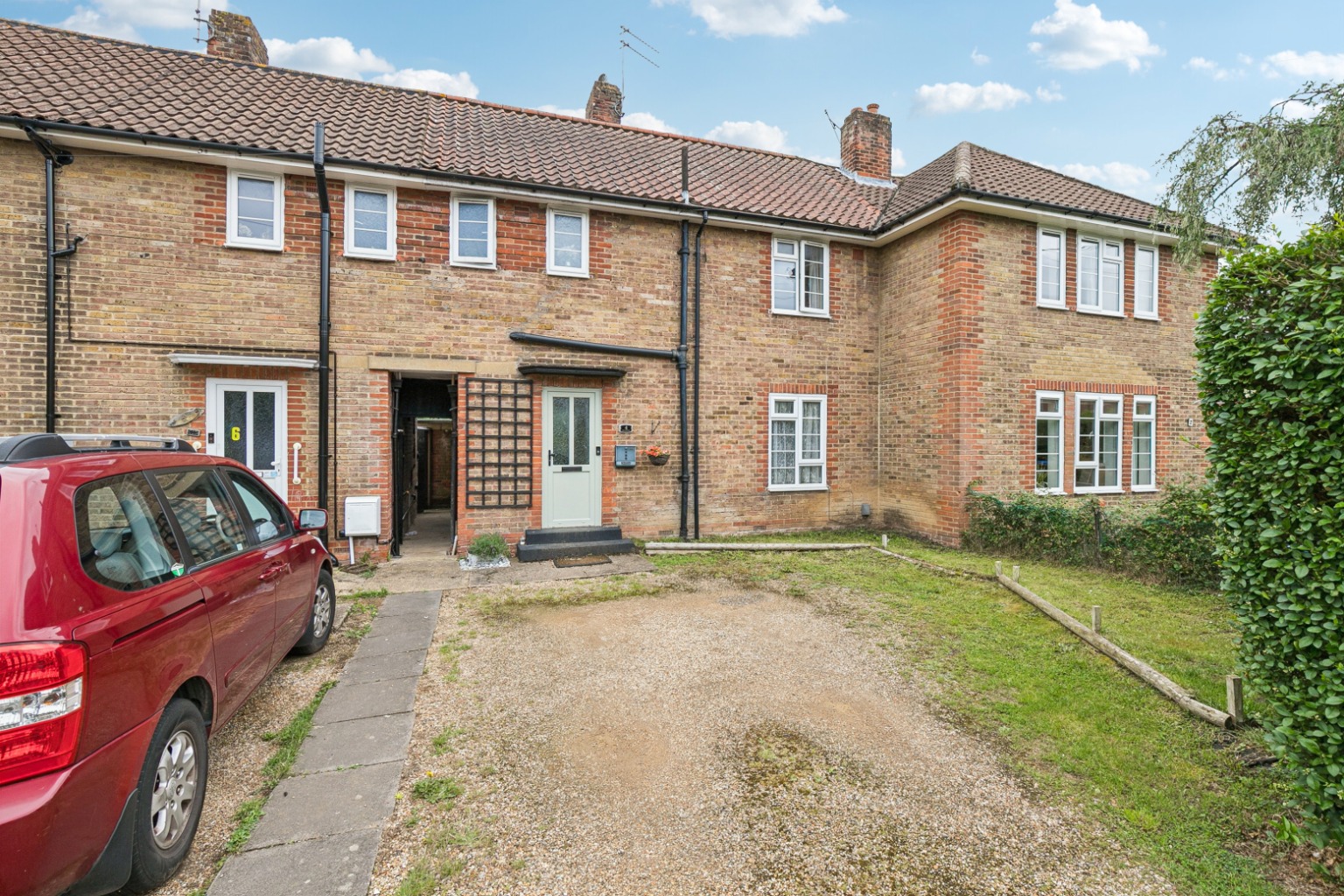 Charming Three-Bed Terraced Home with Modern Kitchen & Off-Street Parking in WGC