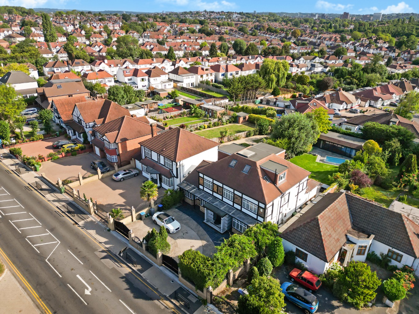 Exceptional Six-Bedroom Detached Family Home with Pool in Wembley's Gated Enclave property first image