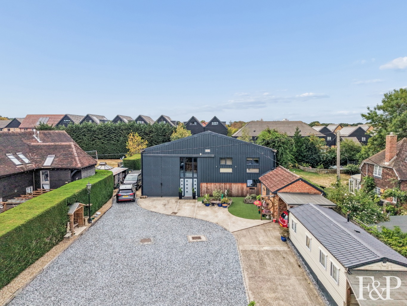 Rare and versatile converted barn – spacious home, workshop, rental income and exceptional potential