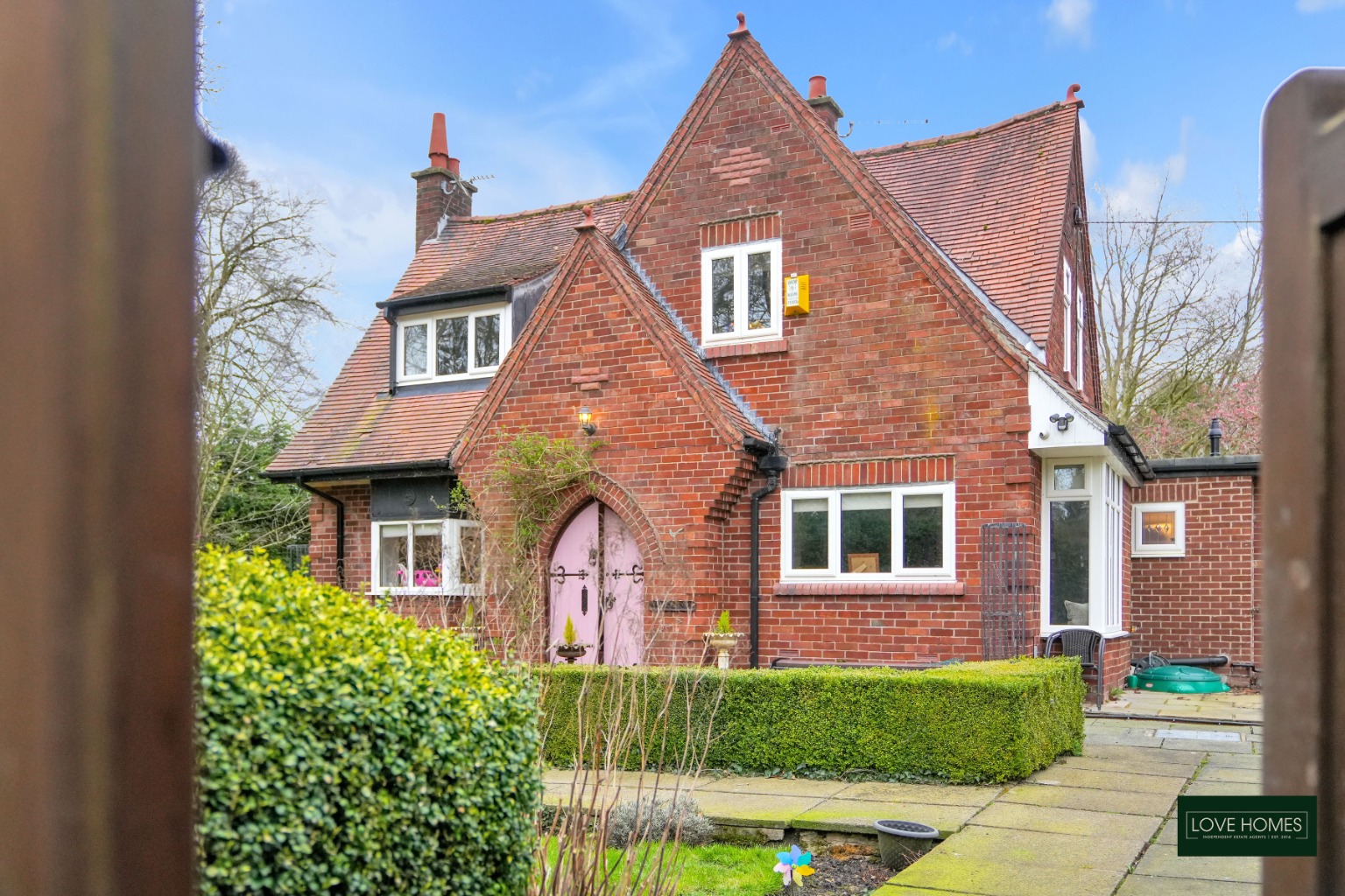 Charming 'Gingerbread House' with Spacious Gardens and Detached Garage with Office Space.
