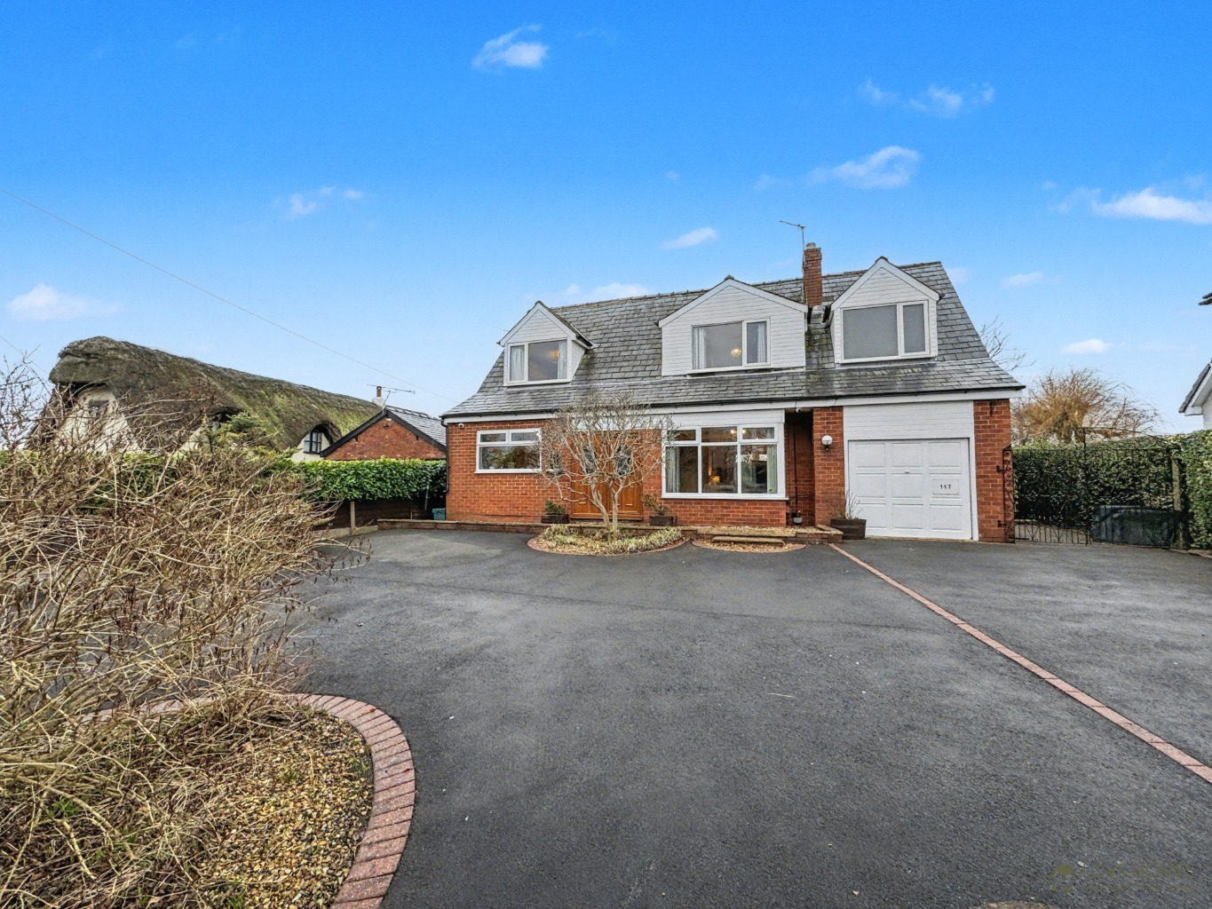 Extended Four-Bedroom Family Home: Semi-Rural Charm with City & Motorway Access