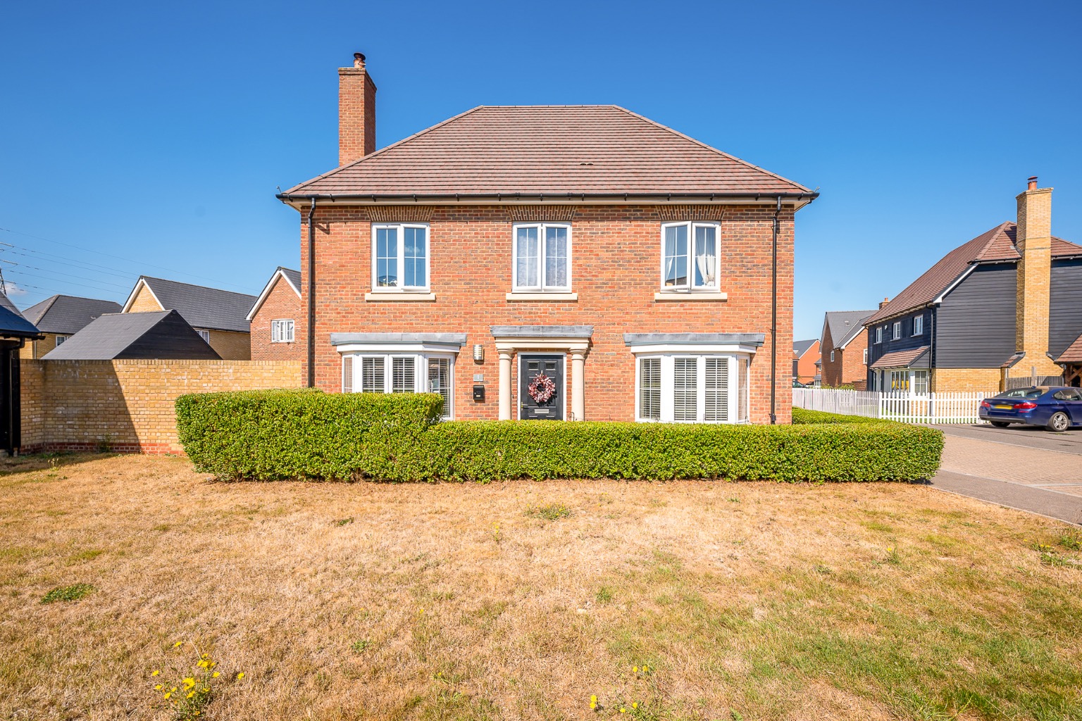 Impressive 4-Bed Detached Home with Wrap-Around Garden, Hot Tub & Double Carport