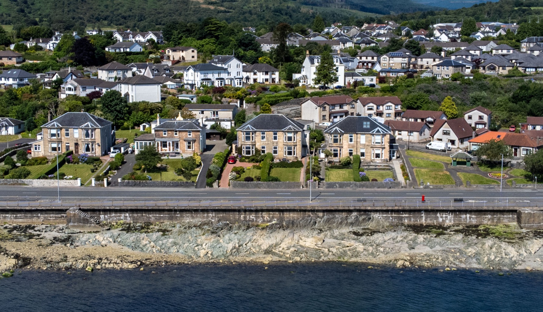 A highly desirable three‑bedroom ground‑floor shore‑front home with breathtaking Clyde views
