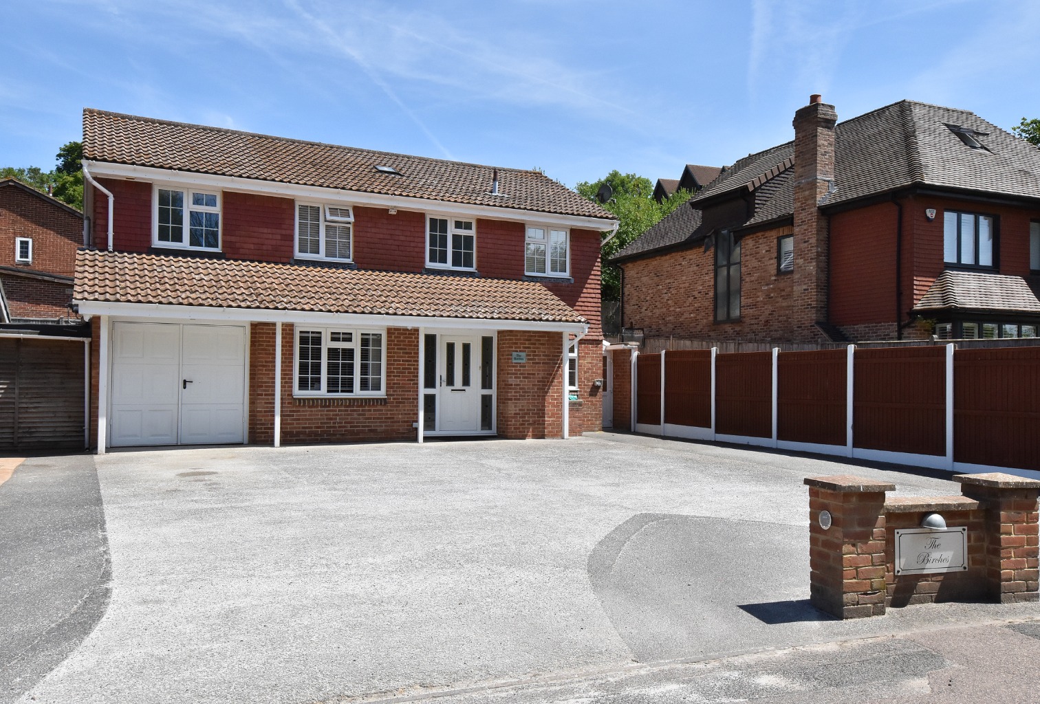 Located in a semi rural area with stunning views over the Kent countryside .