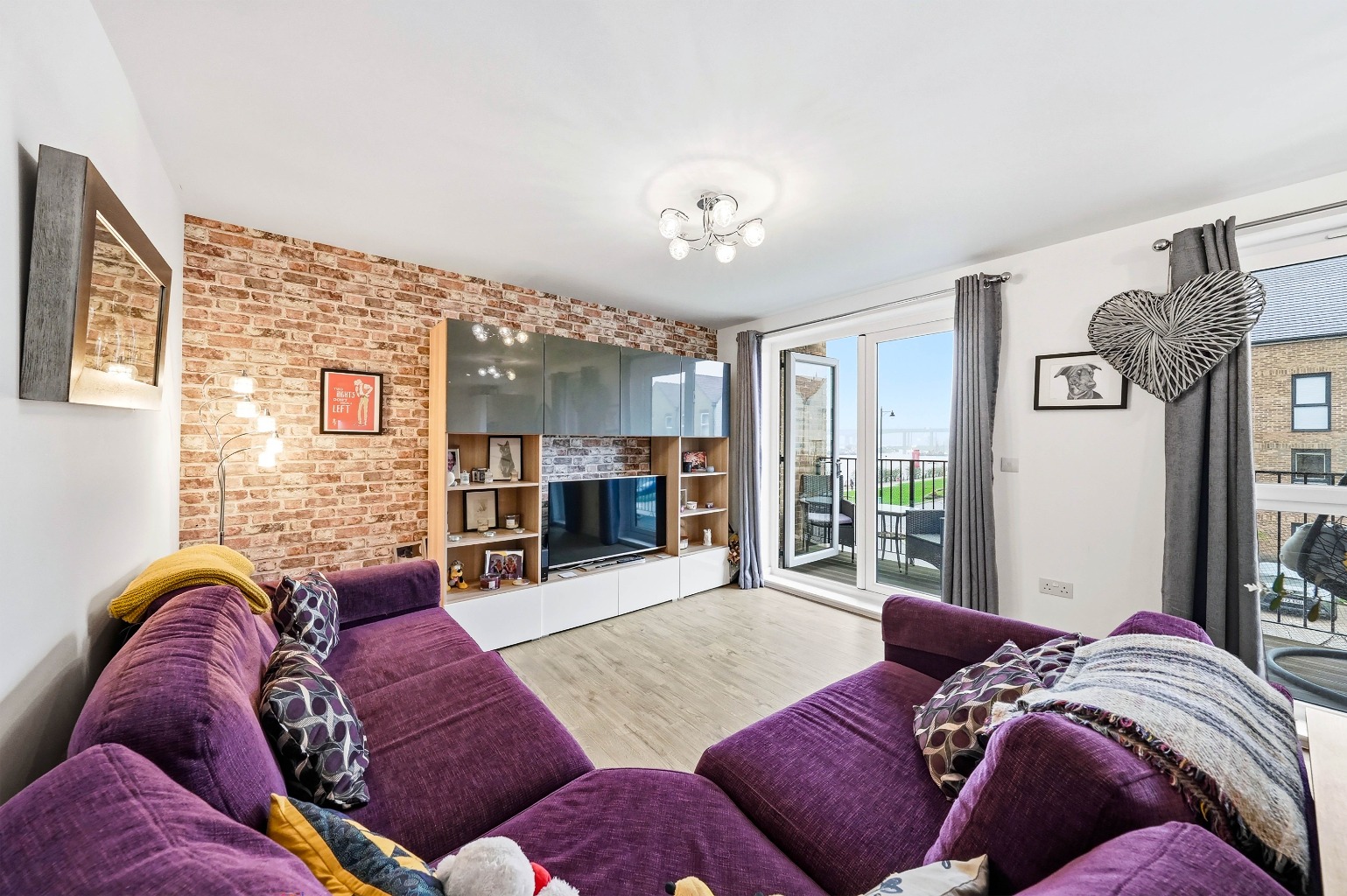 GUIDE PRICE £250,000 TO £270,000 Stunning 2-Bed River View Apartment with Balcony & Parking