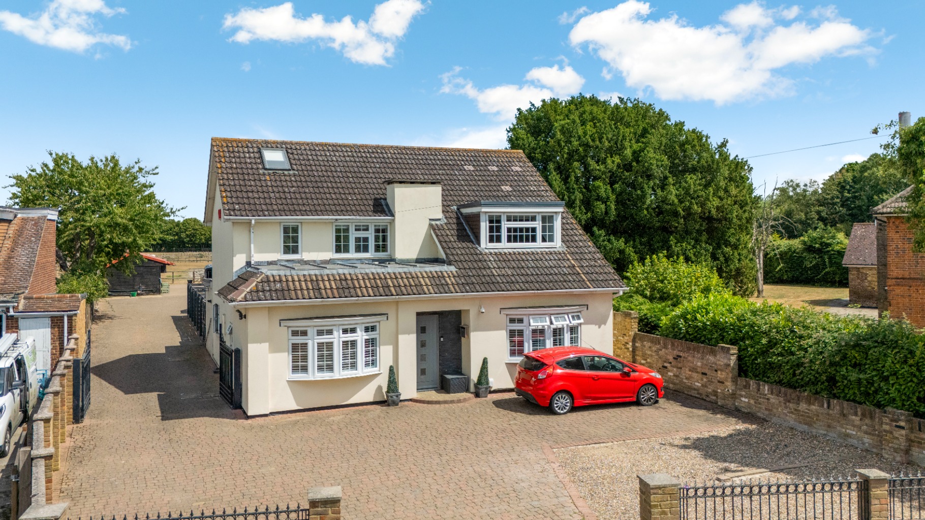 Expansive Detached Home with Equestrian Facilities in Charlton Village, Shepperton