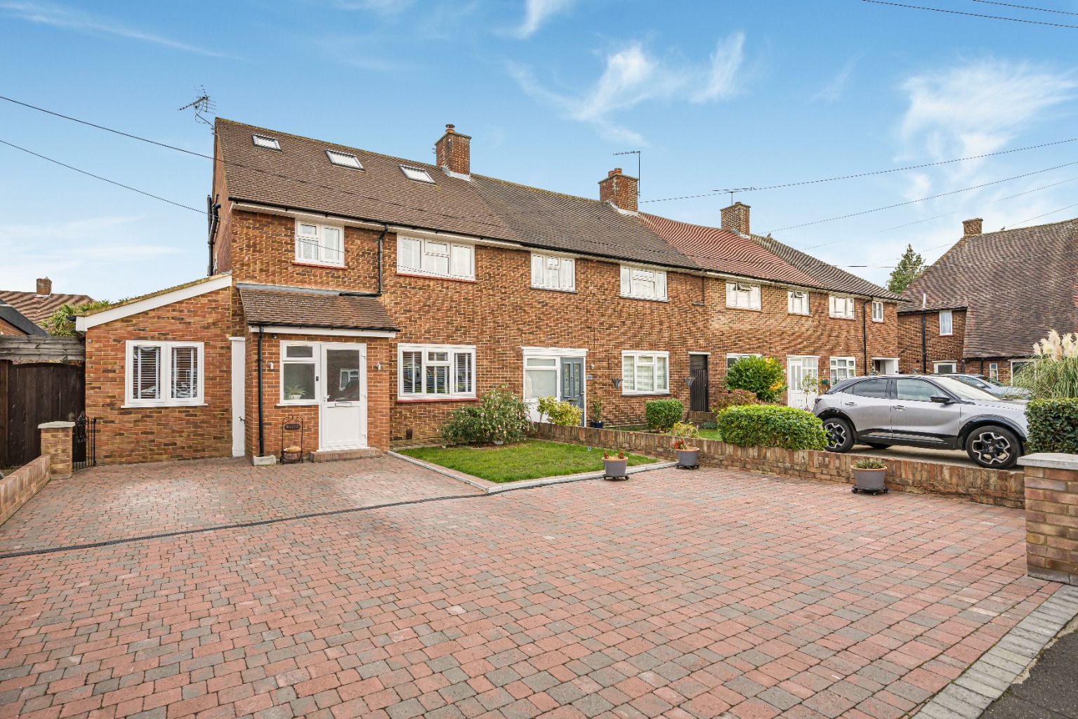 A Large Extended Four Bedroom Family Home with Ample Parking 0.9 Mile From Feltham Station