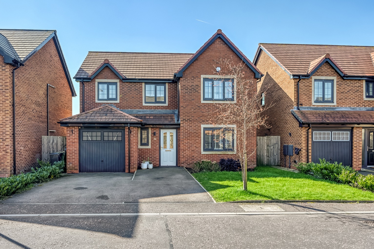 A Modern 4-Bed Detached Home with Open Views, Stunning Garden & Balcony Setting