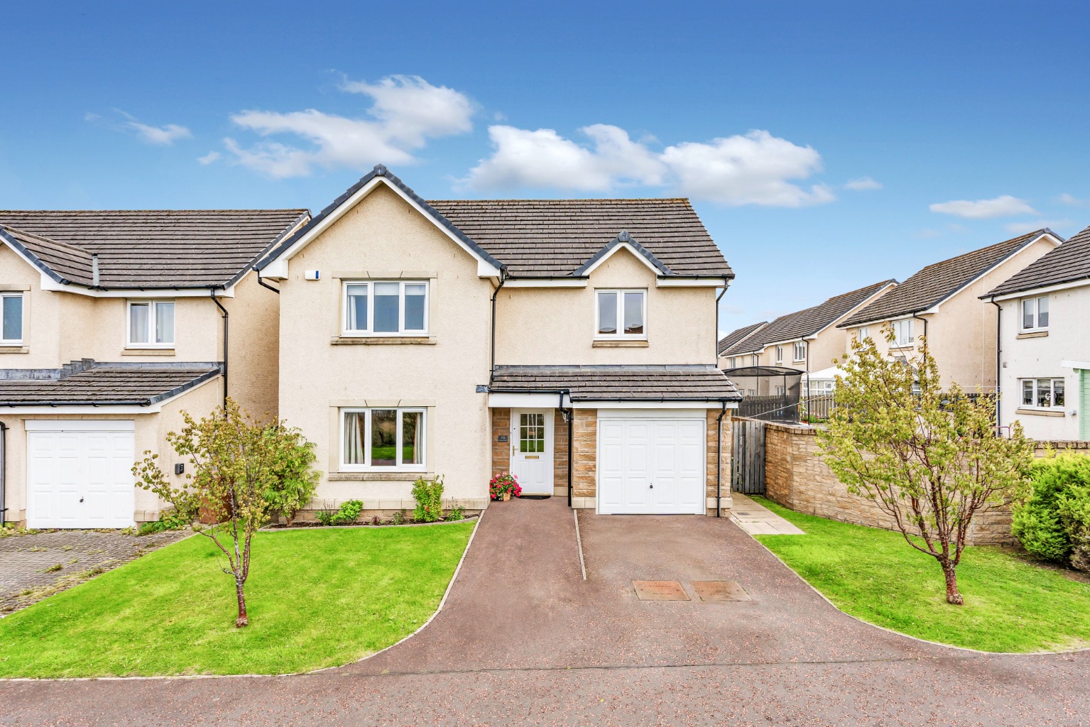 A spacious 4-bedroom detached home in Wester Inch with an open outlook and private mature garden