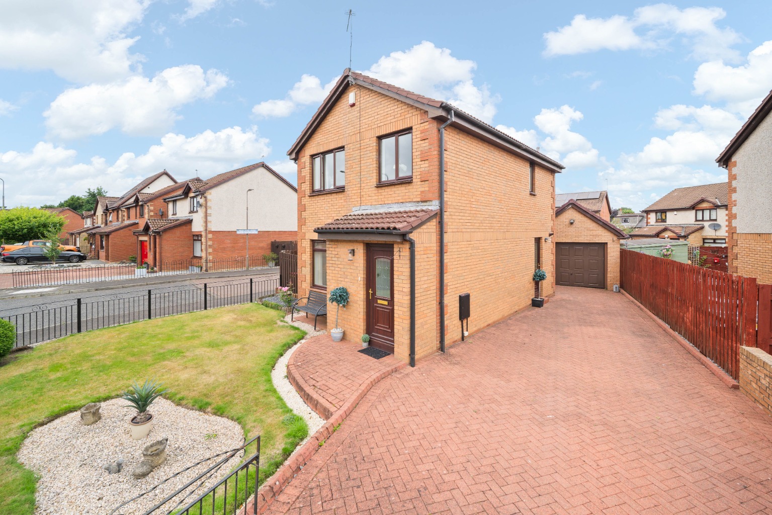 Set on a generous corner plot, this 3-bedroom detached home offers parking & a detached garage.