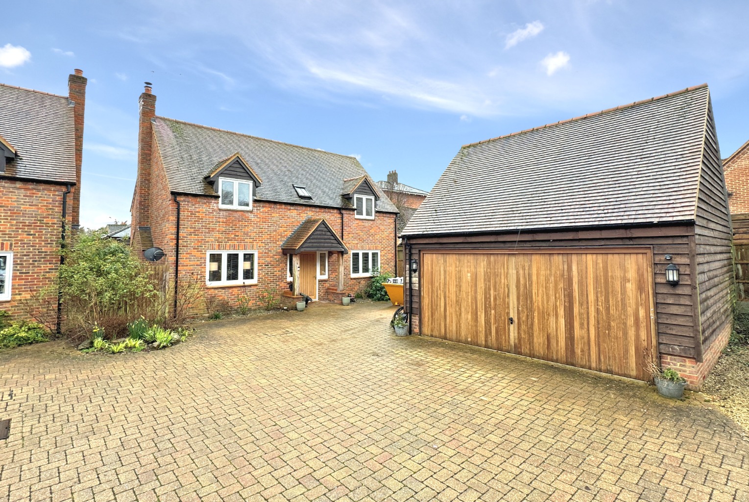 Elegant Four-Bedroom Detached Home in a Prime Village Location