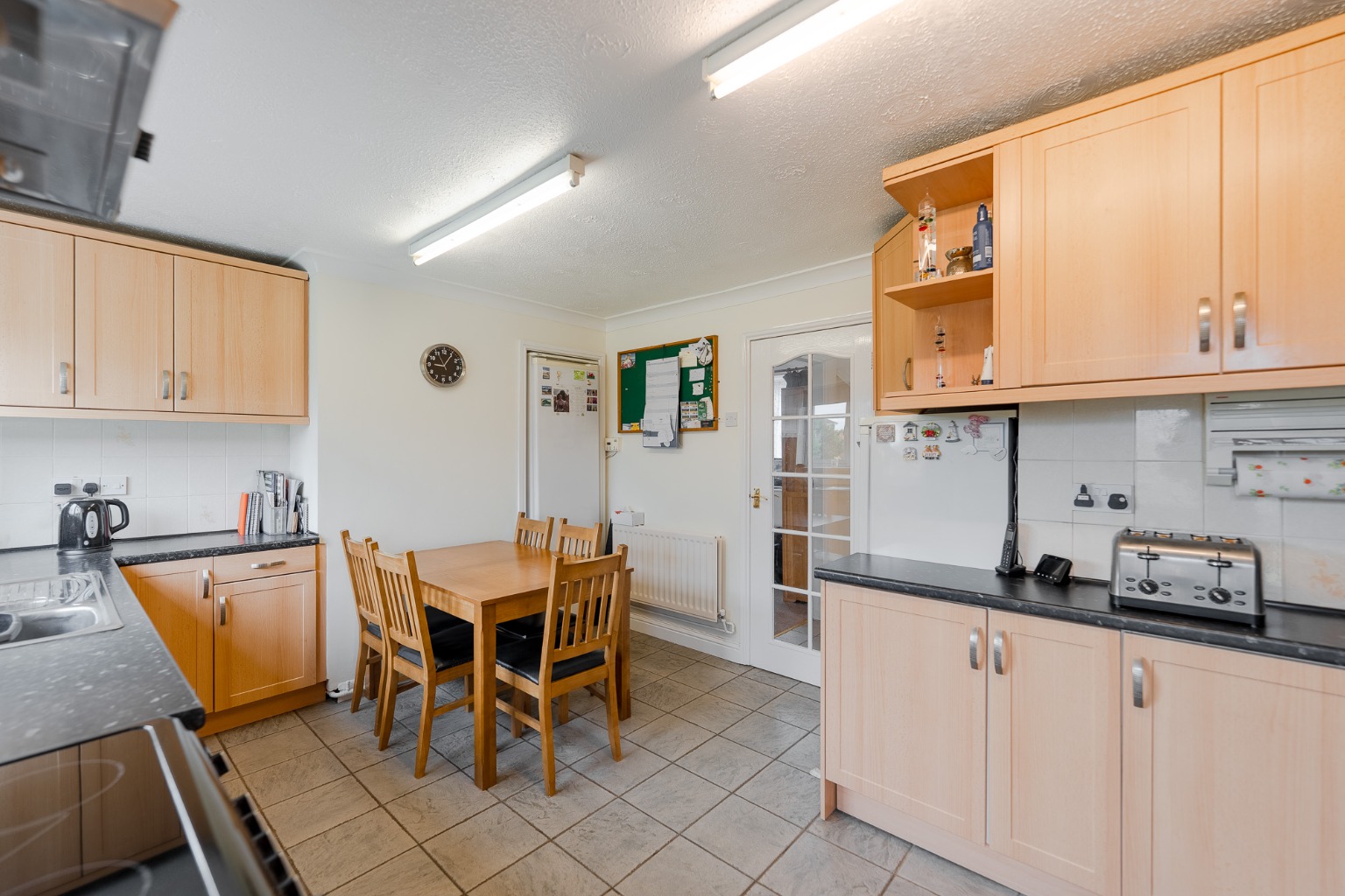 A three bedroom family home occupying a desirable corner plot. Property image 4