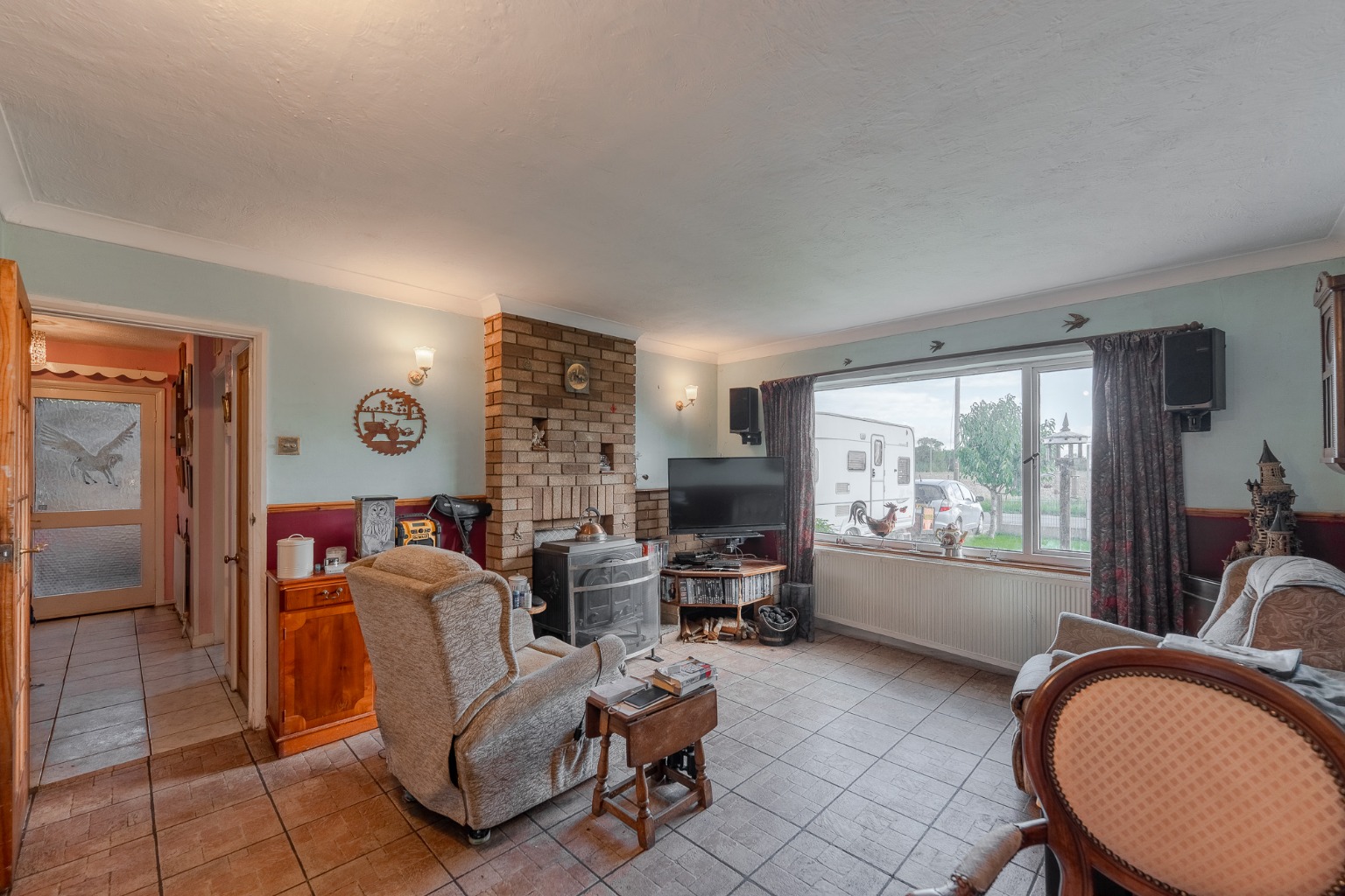 Detached chalet bungalow offering versatile accommodation, over looking fields to front and rear Property image 6