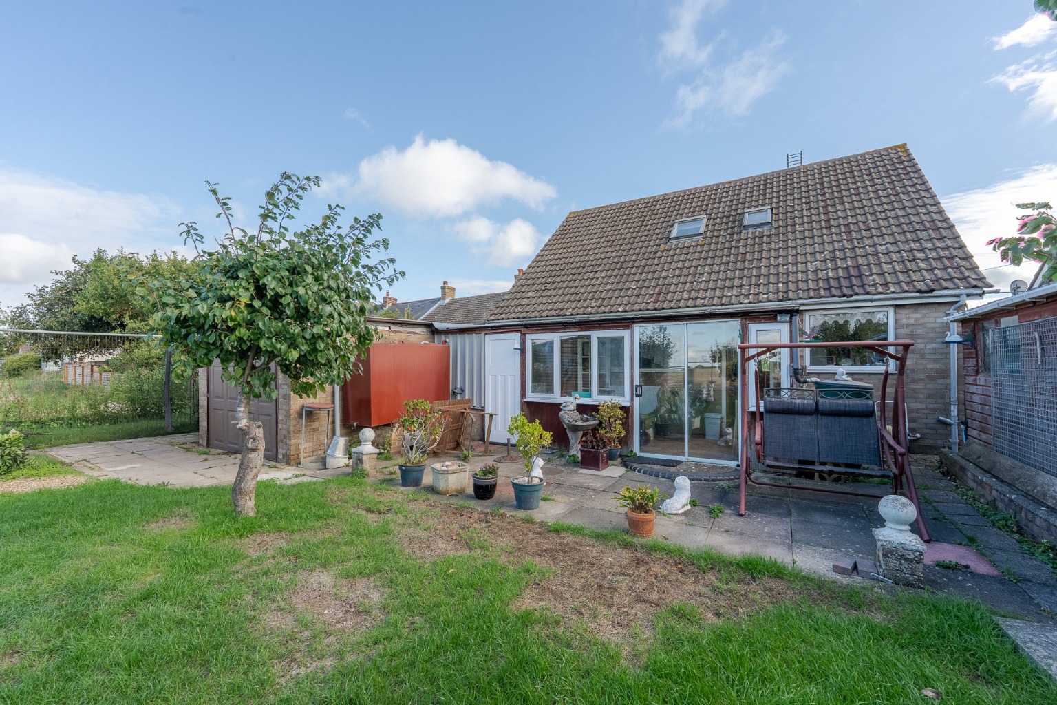 Detached chalet bungalow offering versatile accommodation, over looking fields to front and rear Property image 2