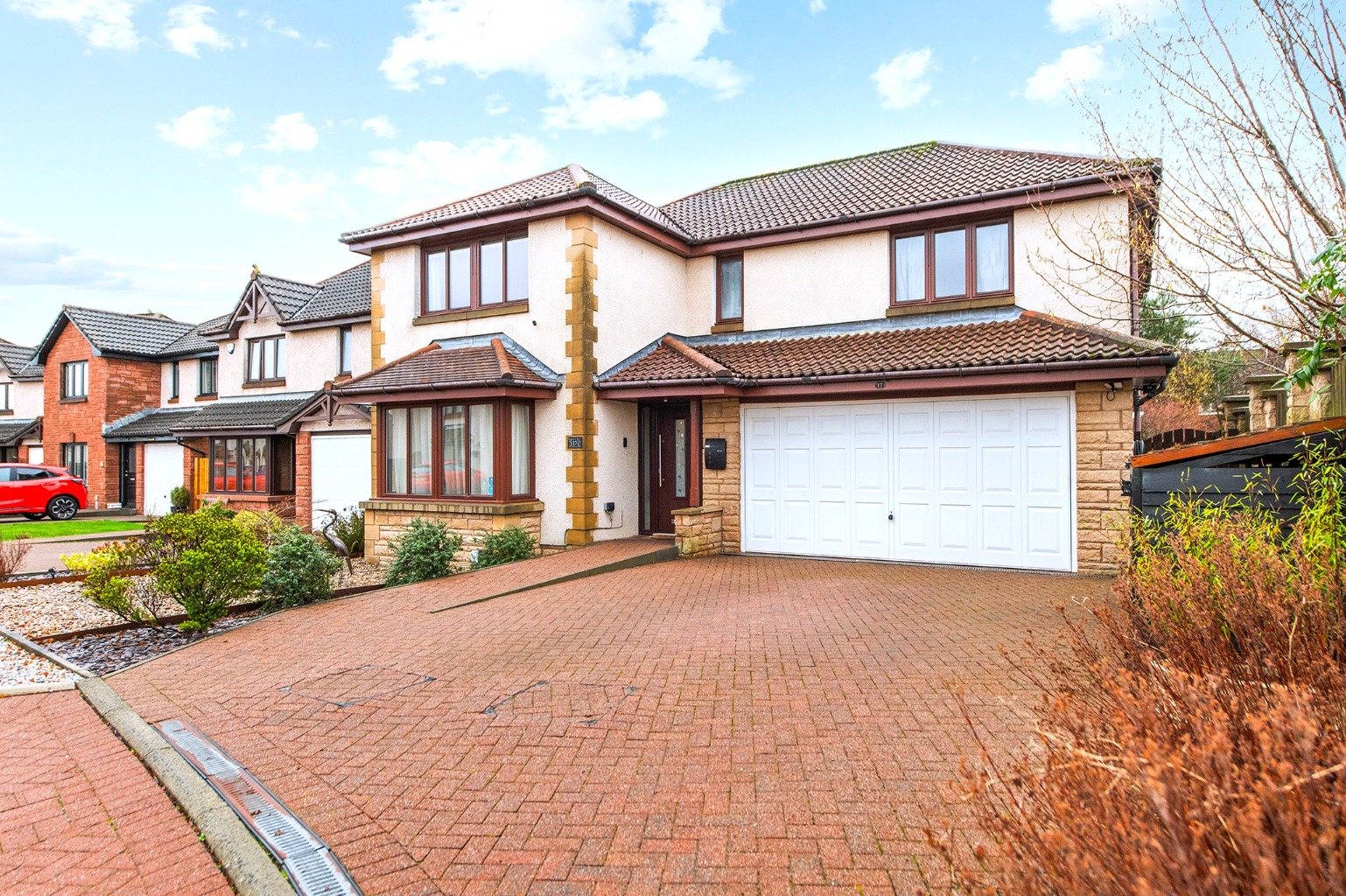 Outstanding five bed detached villa complete with a double integral garage and extensive gardens