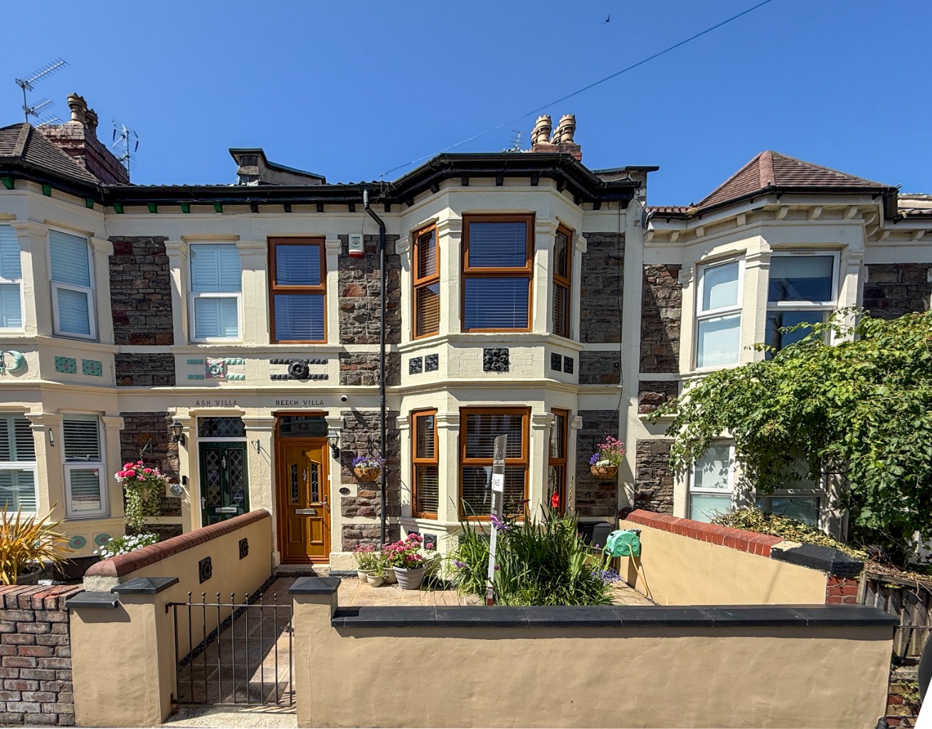 An immaculate and extended, three-double-bedroom terraced home with double-garage and two bathrooms.