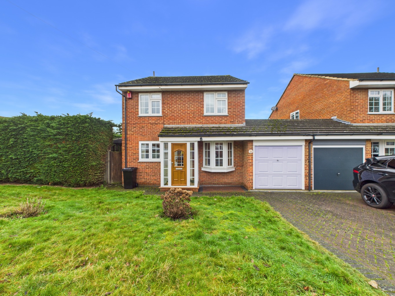 Delightful four bedroom, link-detached home for sale in Bickley