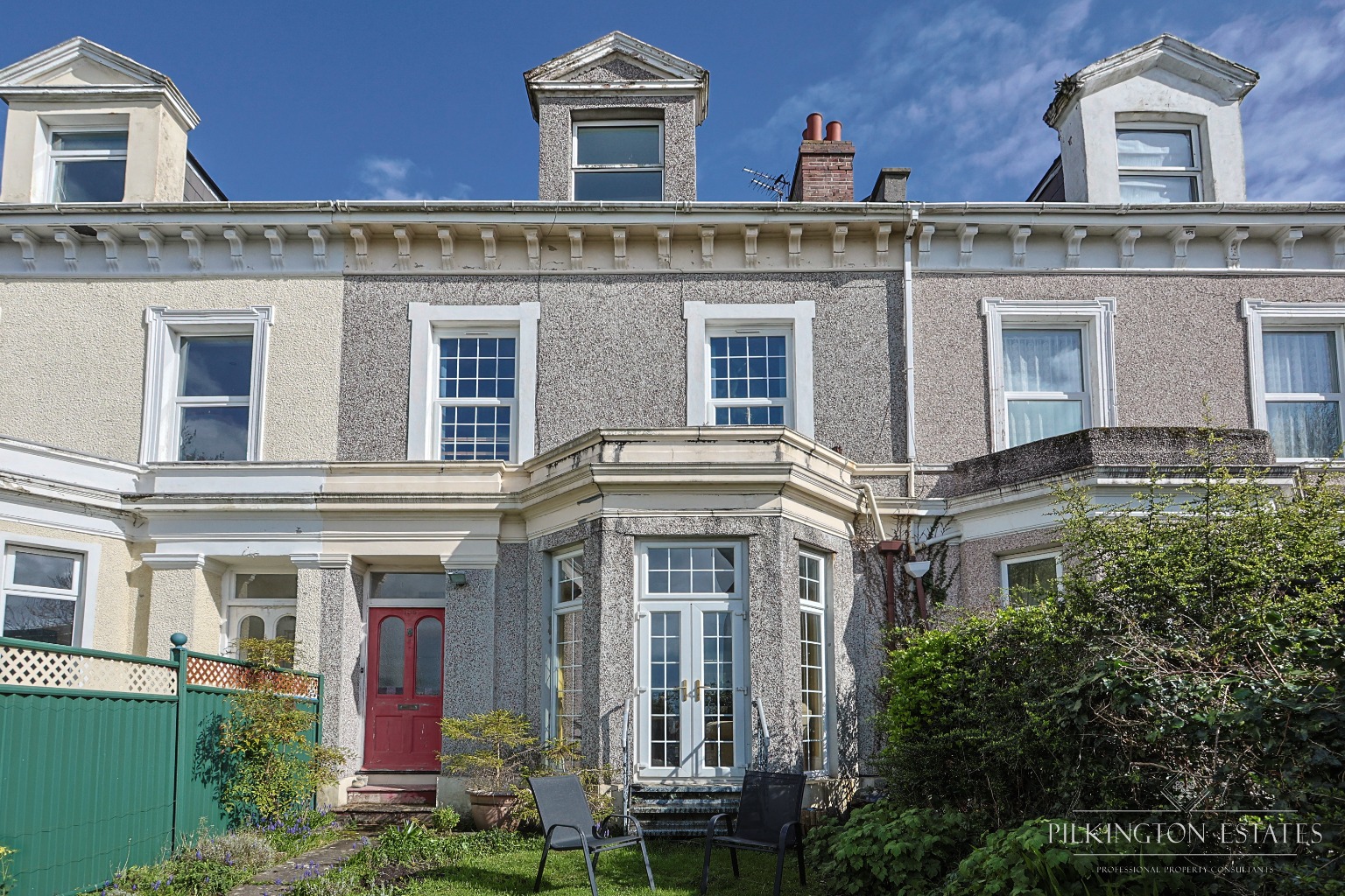 Four-bed home for sale by online auction, offering flexible living and development potential.