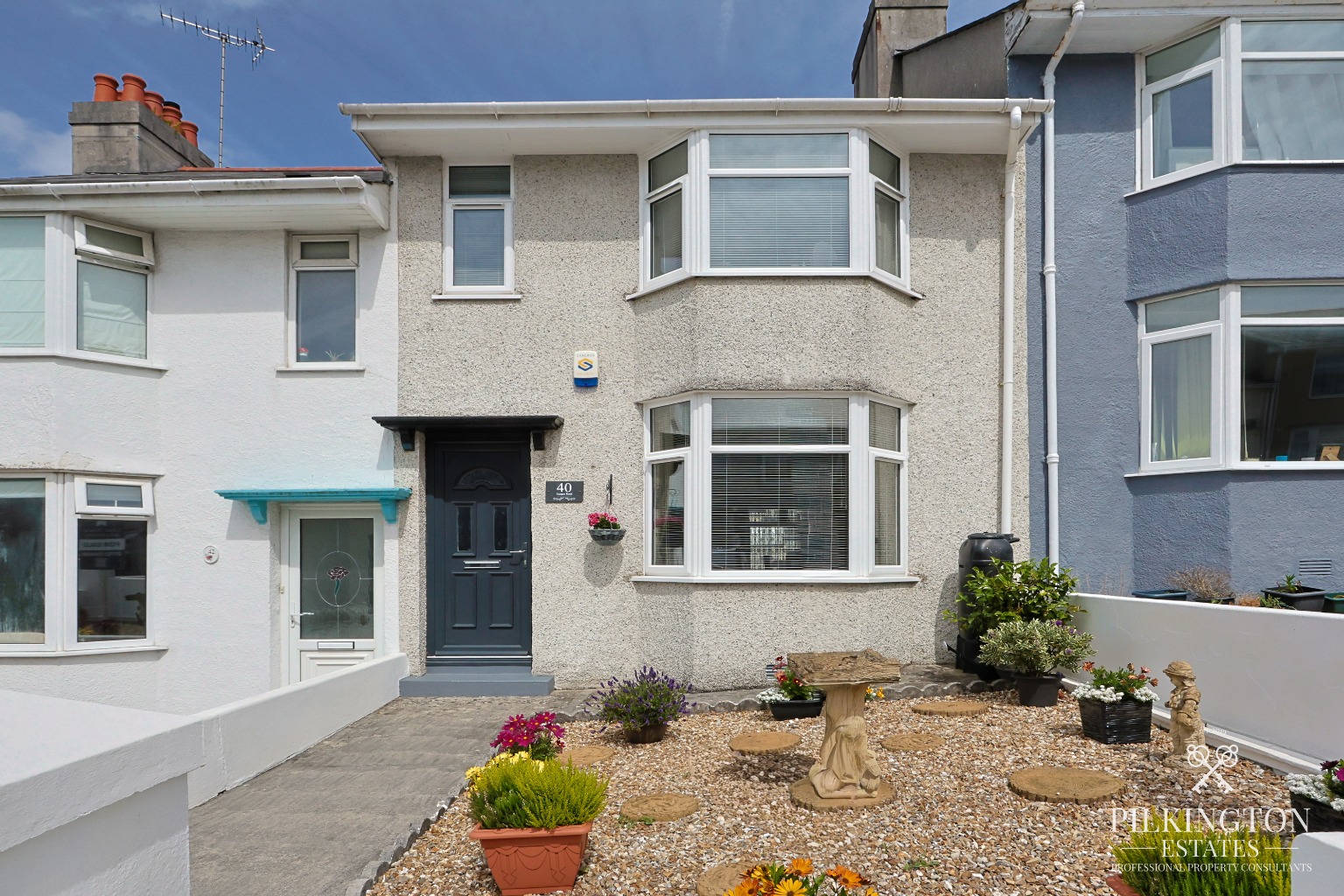 Spacious Four-Bedroom Terraced Home with Garden & Parking in Popular Milehouse Location Property image 1
