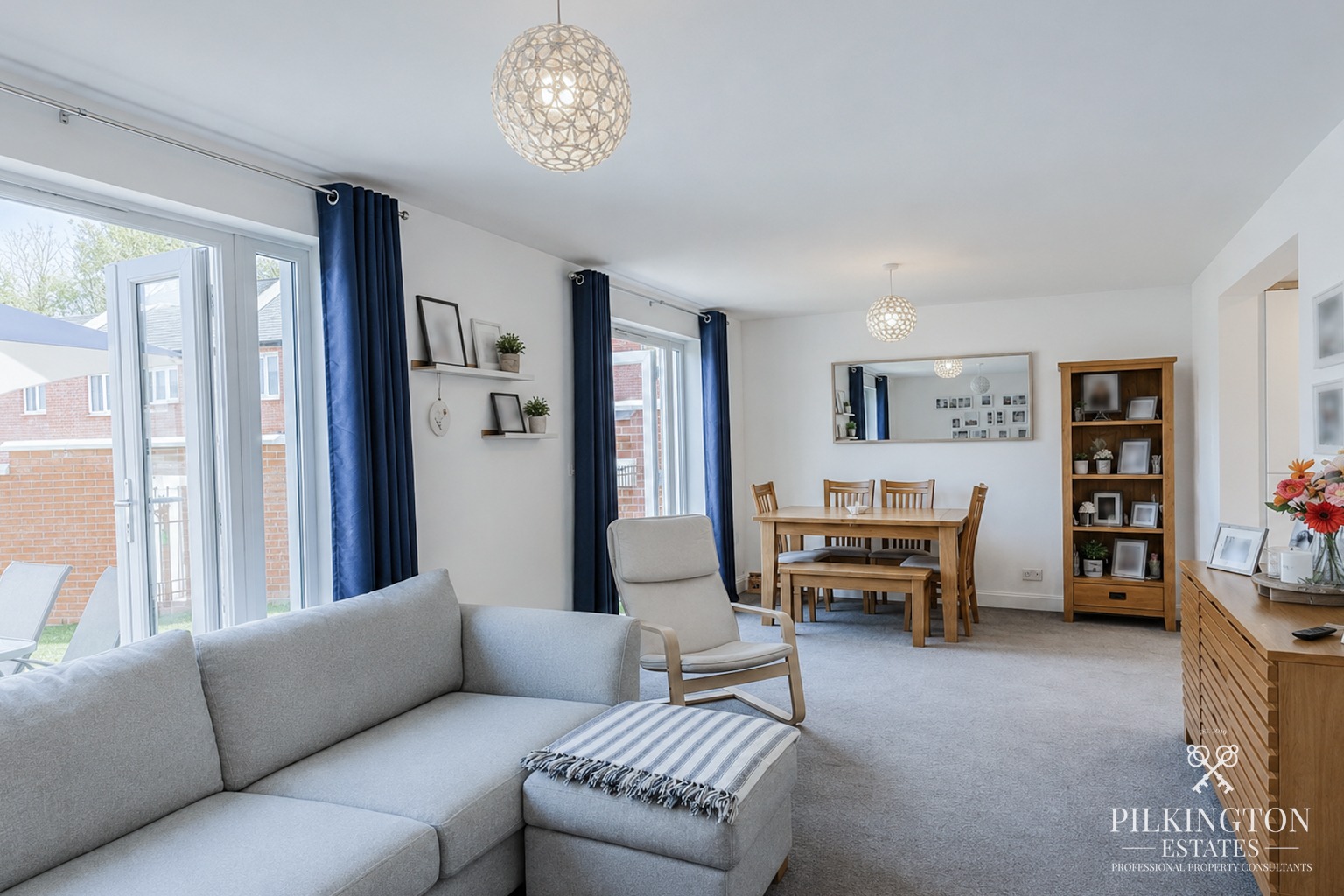 Modern 4-Bed Detached Home with Gated Driveway & Garage in Popular Sherford Property image 3