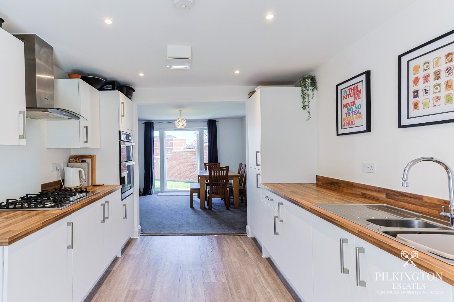 Modern 4-Bed Detached Home with Gated Driveway & Garage in Popular Sherford Property image 6