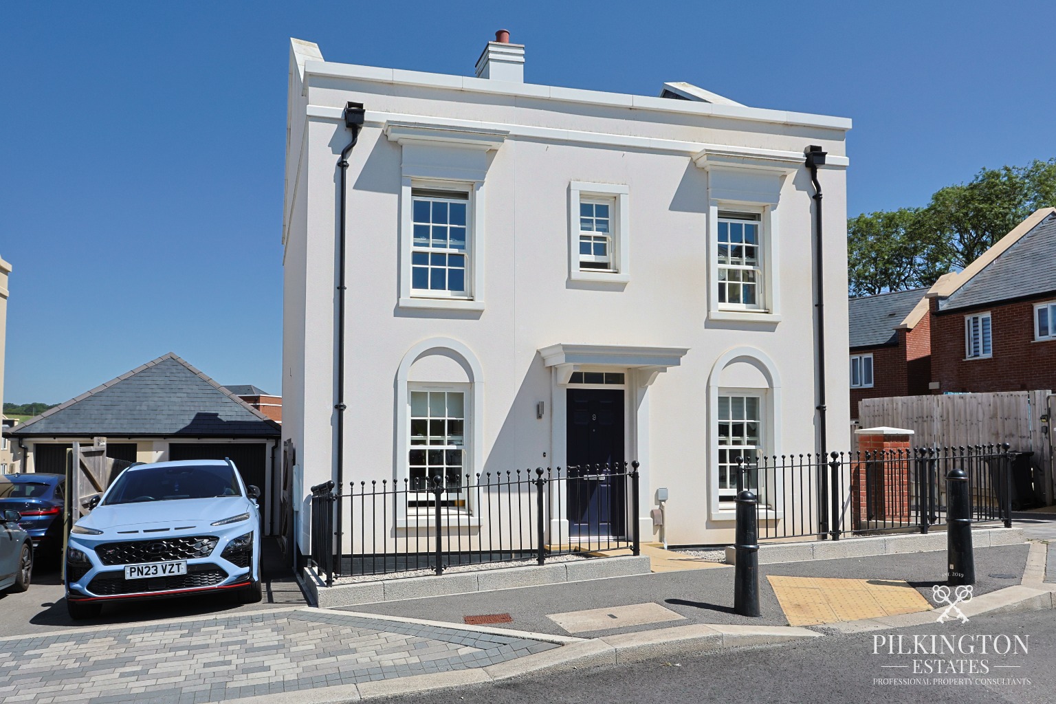 Modern 4-Bed Detached Home with Gated Driveway & Garage in Popular Sherford Property image 1