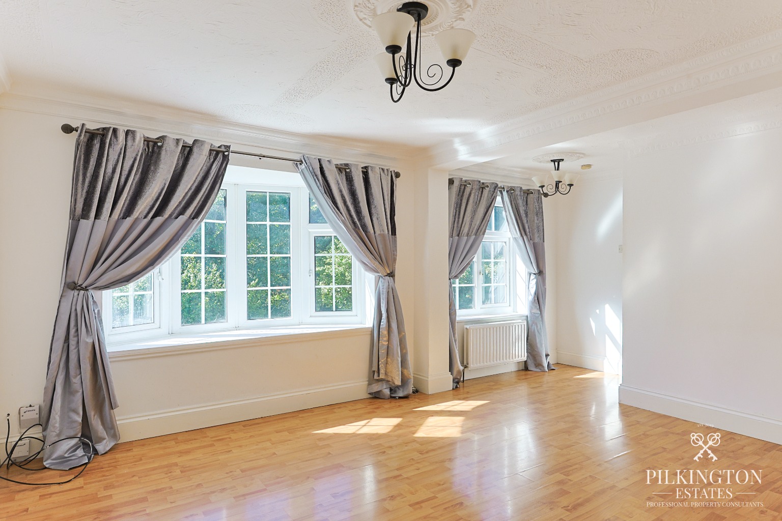 Spacious Three-Bedroom Home Over Three Floors with Garage, Driveway & Tiered Garden Property image 2