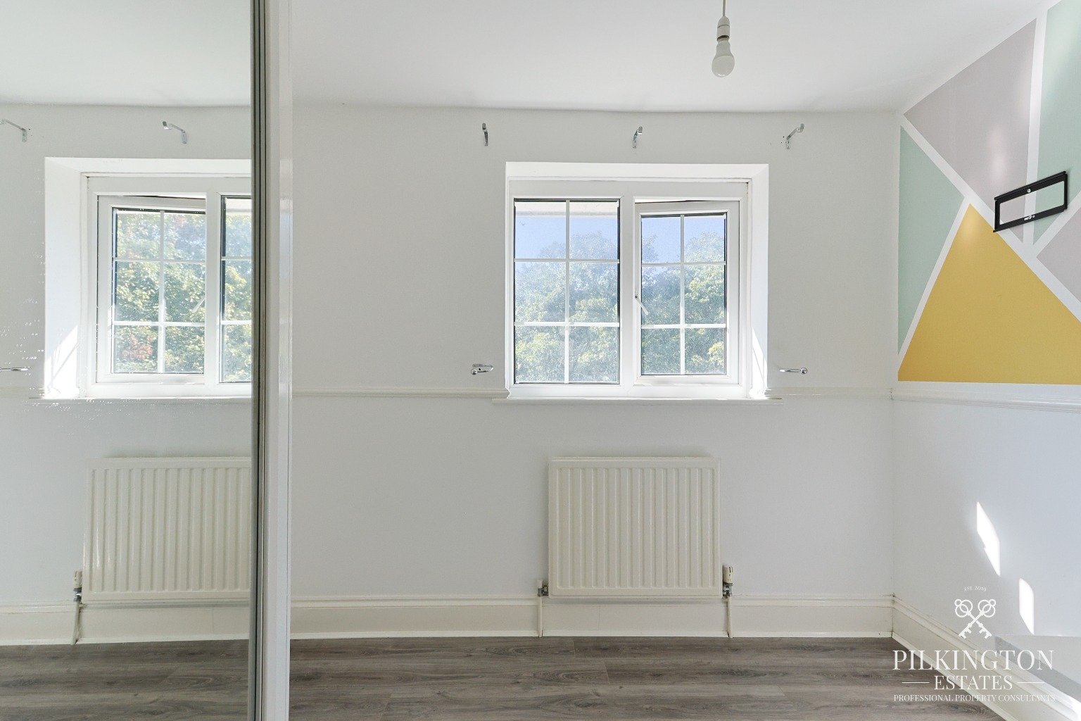 Spacious Three-Bedroom Home Over Three Floors with Garage, Driveway & Tiered Garden Property image 7