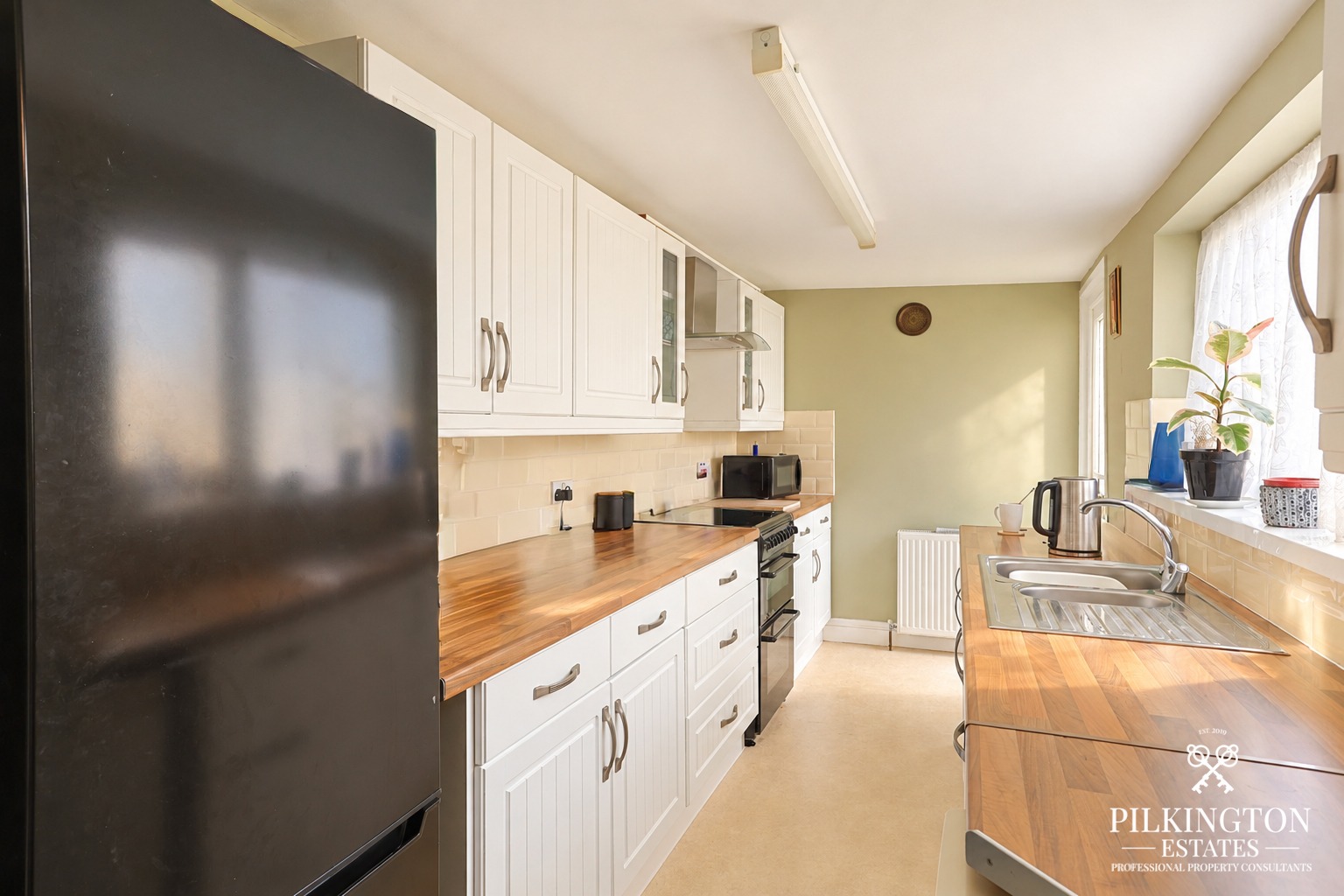 Spacious 2-Bedroom Home with 3rd Bedroom Potential & Large Kitchen Property image 4