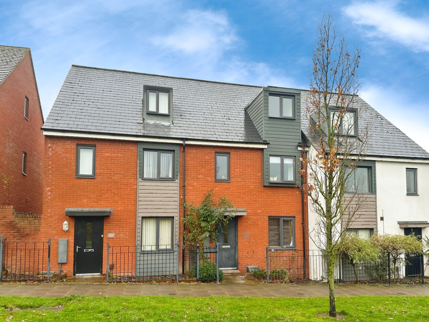 Modern Three-Storey Terraced Home with Allocated Parking in Lawley Village