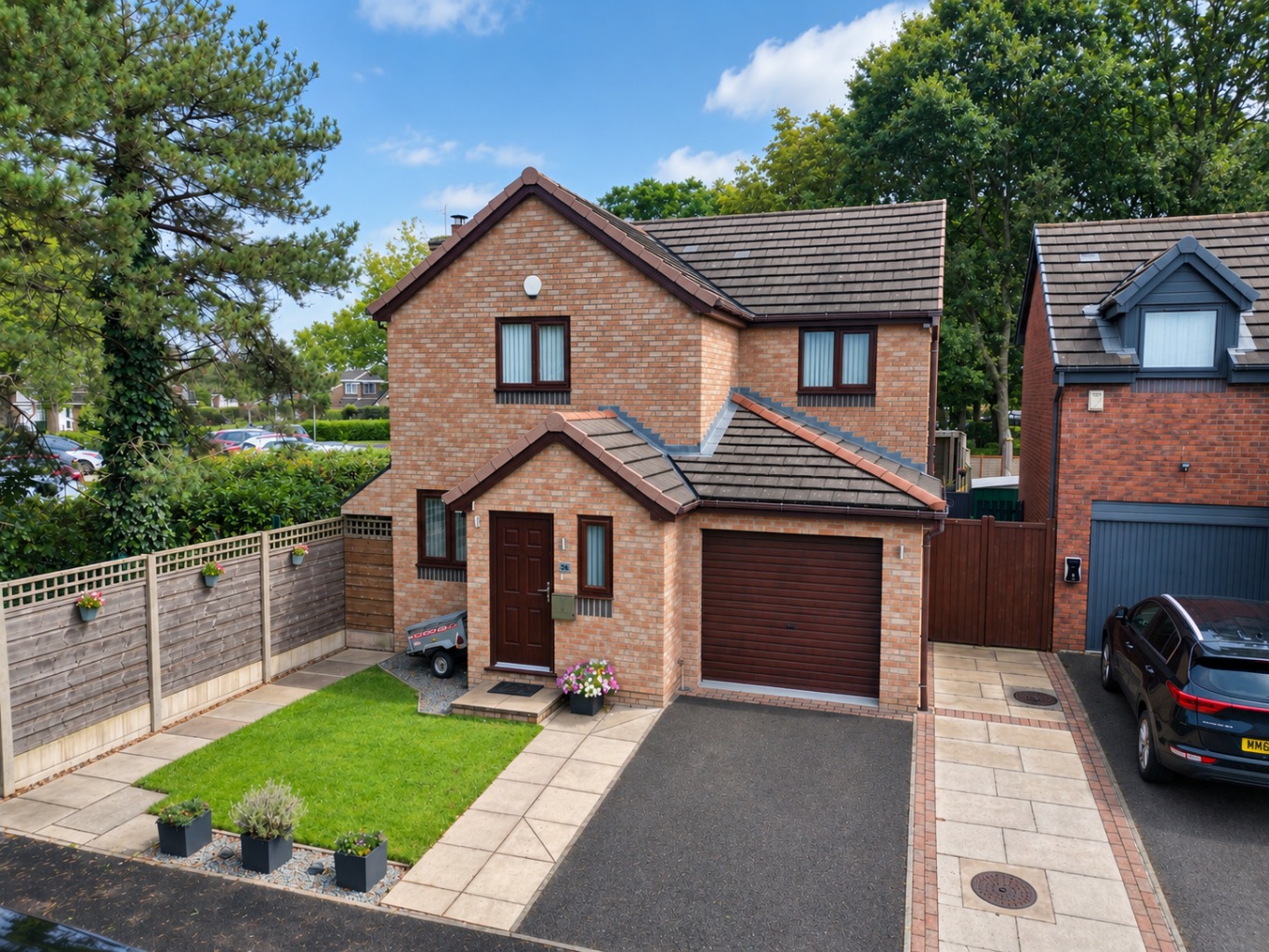 IMPRESSIVE FOUR-BEDROOM DETACHED HOME WITH OPEN-PLAN DINING, MULTIPLE BATHROOMS & SUPERB GARDENS